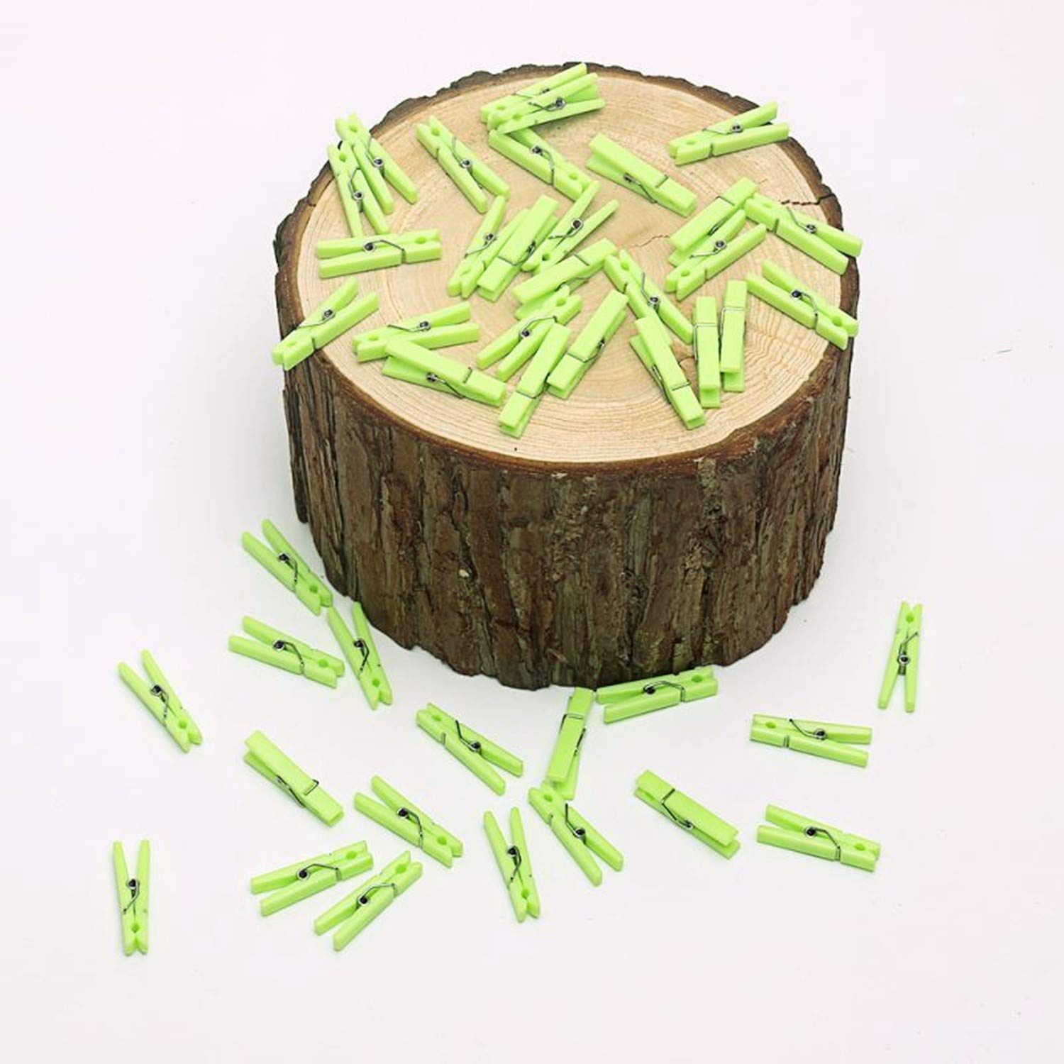 50 Pack Small Clear Plastic Clothespins - 1.4 x 0.25 Inch Mini Clips for Clothesline, Photos, DIY Crafts, Baby Showers & Party Decorations (Green) - Perfect for Hanging Laundry, Displaying Pictures, and Craft Projects