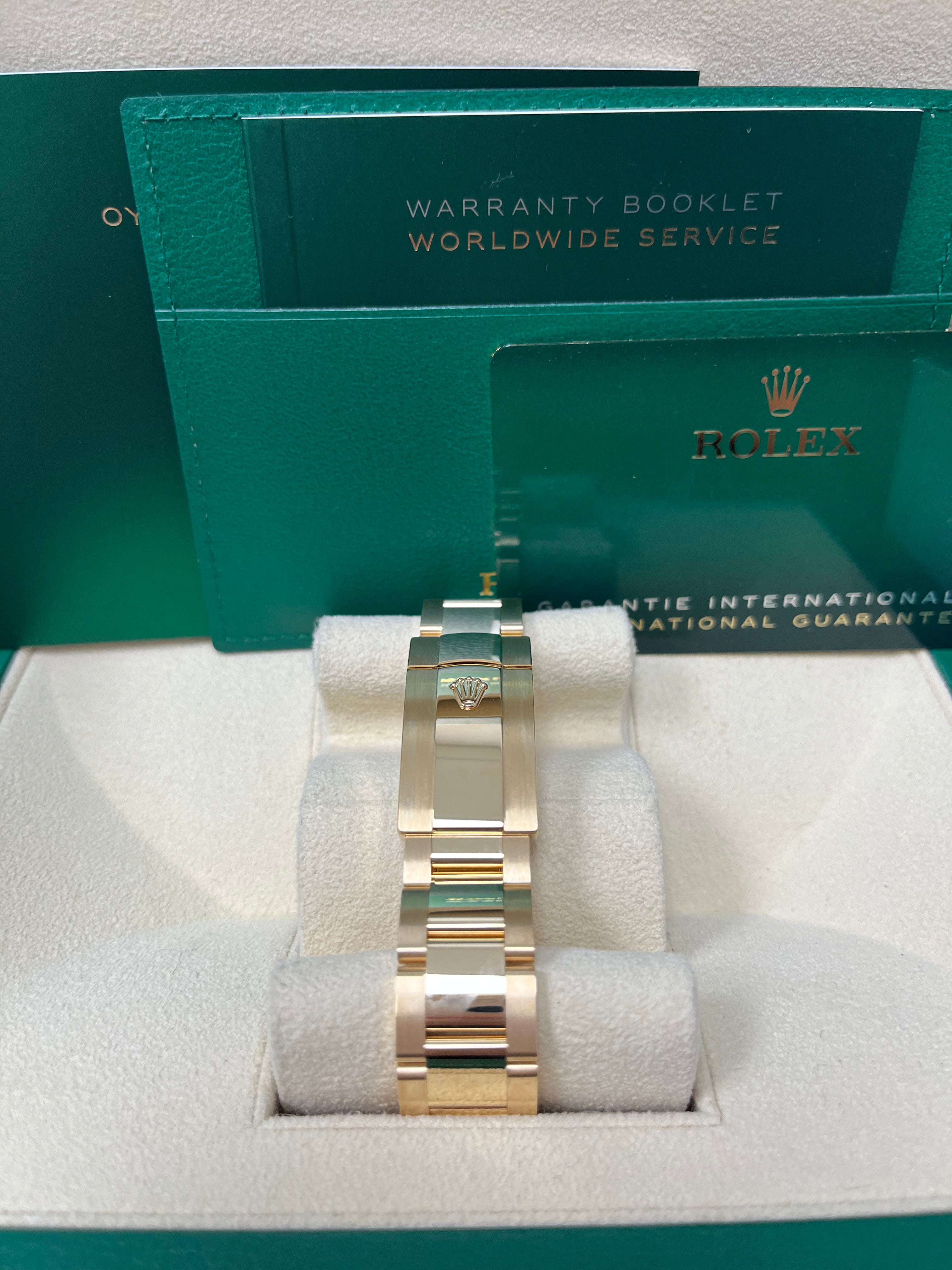 Rolex Sky-Dweller Yellow Gold Watch with White Dial & Oyster Bracelet (Ref# 326938) - Luxury Timepiece for Business Travelers & Watch Collectors
