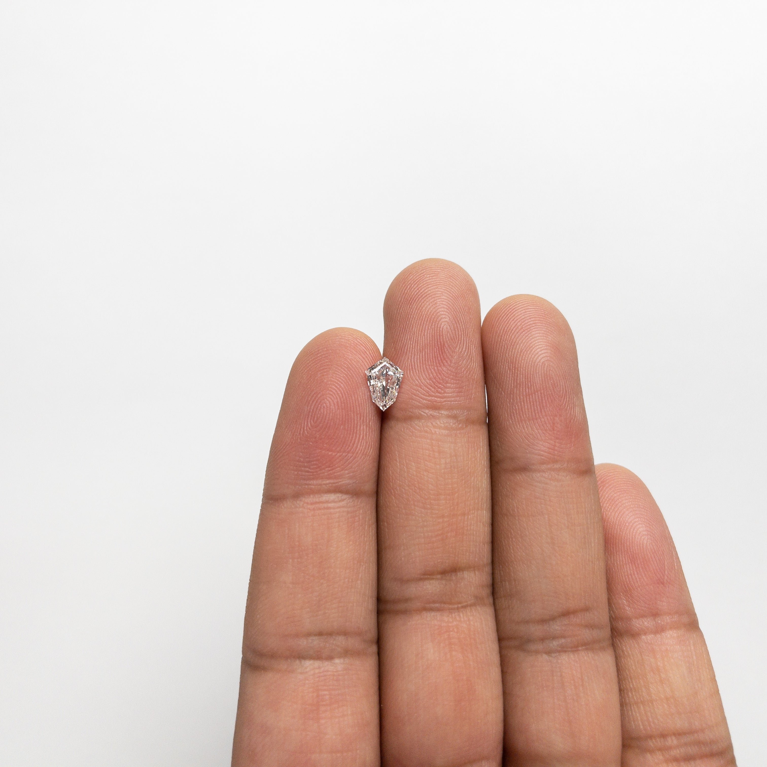 0.79ct Kite Step Cut Diamond (7.96x5.67x2.65mm) - VS2 Clarity, F Color - Elegant Engagement Ring Center Stone for Unique Jewelry Designs