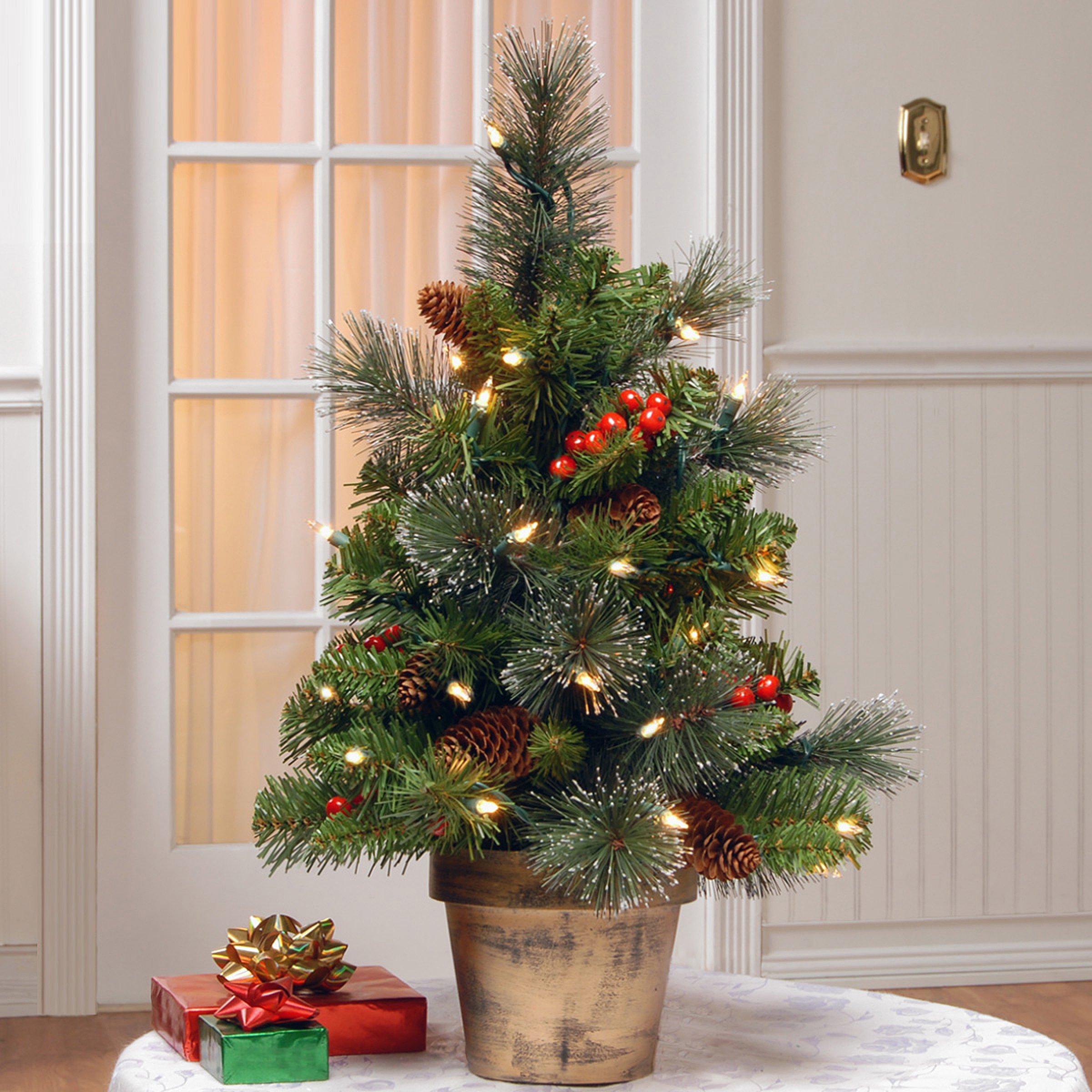 National Tree Company 2ft Pre-Lit Artificial Mini Christmas Tree - Green Crestwood Spruce with White Lights, Pine Cones & Berry Clusters - Frosted Branches & Pot Base Included - Perfect for Tabletop, Office, or Small Space Holiday Decor