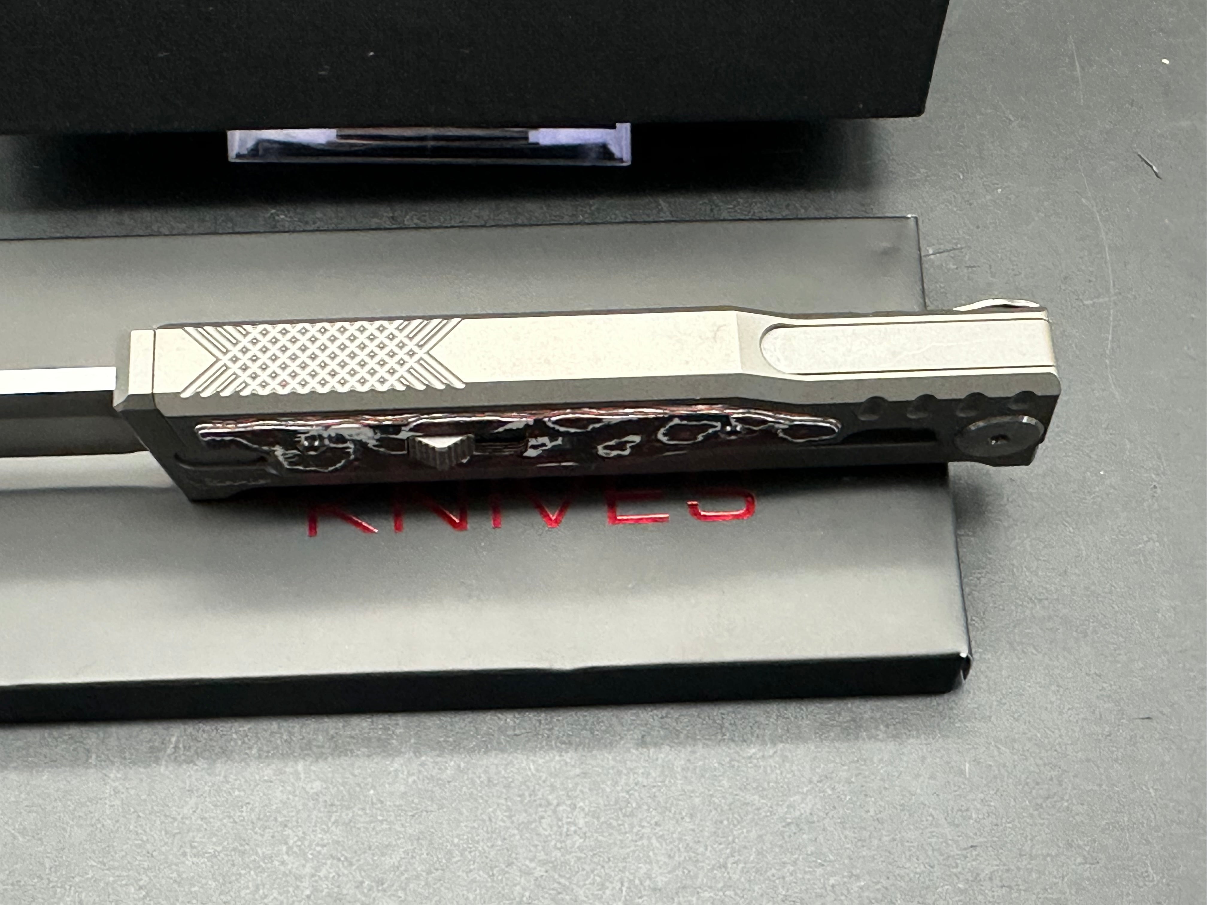 Reate EXO-M Folding Knife - Grey Titanium Frame with Red Marble Fat Carbon Inlays, Tanto Elmax Blade - EDC Pocket Knife for Outdoor, Camping & Everyday Carry