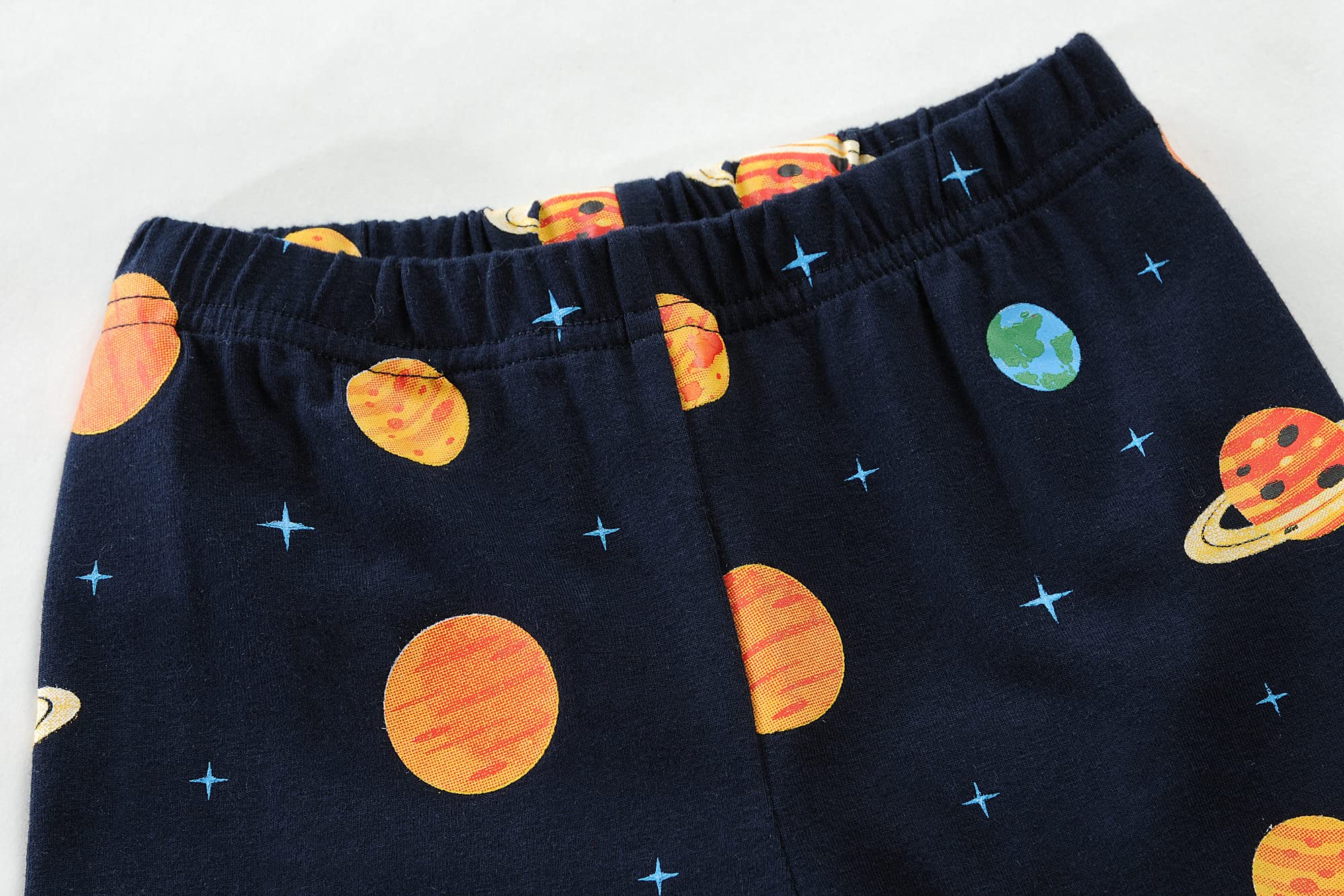 **Monster Truck & Dinosaur Cotton Pajama Set for Toddler Boys (2-7 Years) – 2-Piece Sleepwear with Planets Design – Soft & Comfortable PJS for Kids' Bedtime & Lounging**