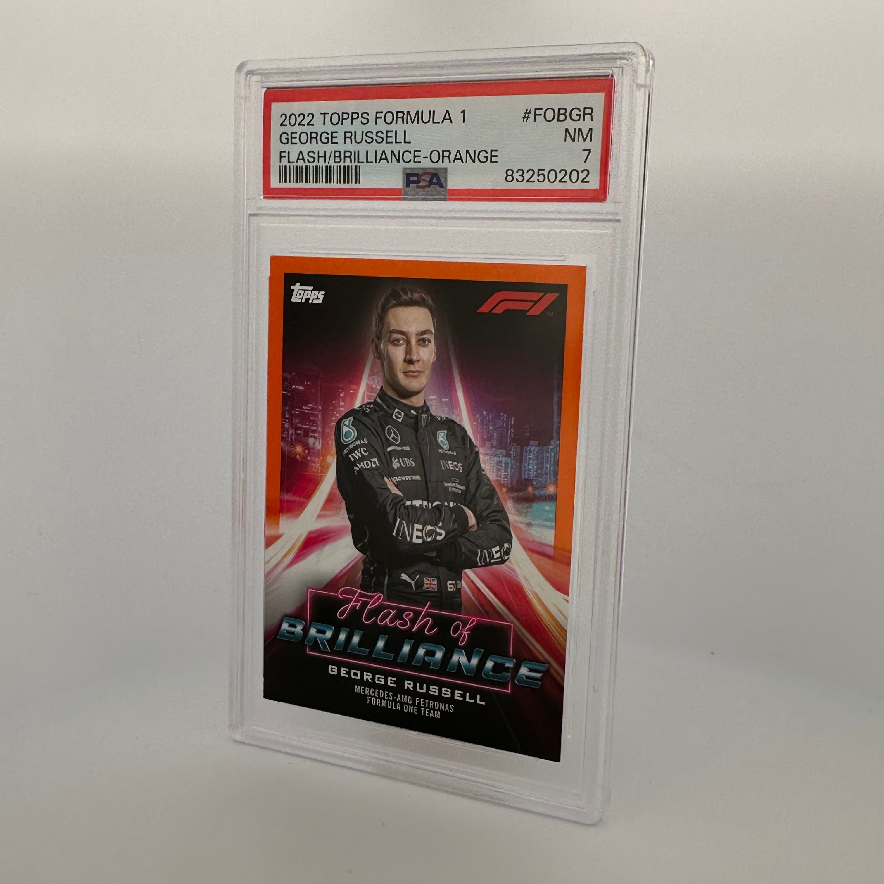 PSA 7 George Russell #FOBGR Flash Of Brilliance Orange Trading Card - Perfect for Sports Collectors, Investors & Memorabilia Enthusiasts