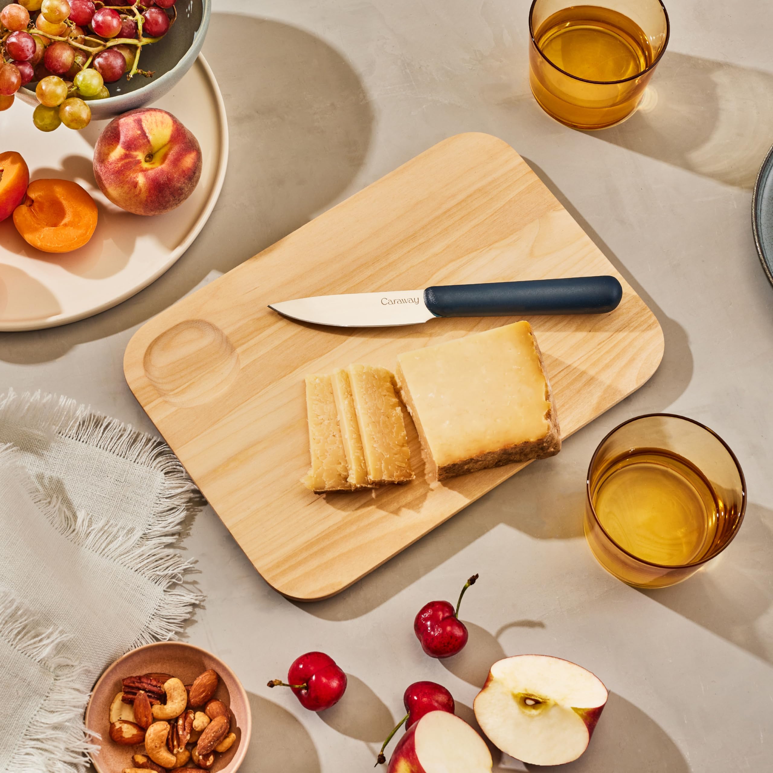 Caraway 4-Piece Reversible Wooden Cutting Board Set - FSC-Certified Birch - Natural Mineral Oil & Beeswax Finish - Small, Medium & Large Sizes with Storage Organizers - Perfect for Meal Prep, Charcuterie Boards & Kitchen Organization