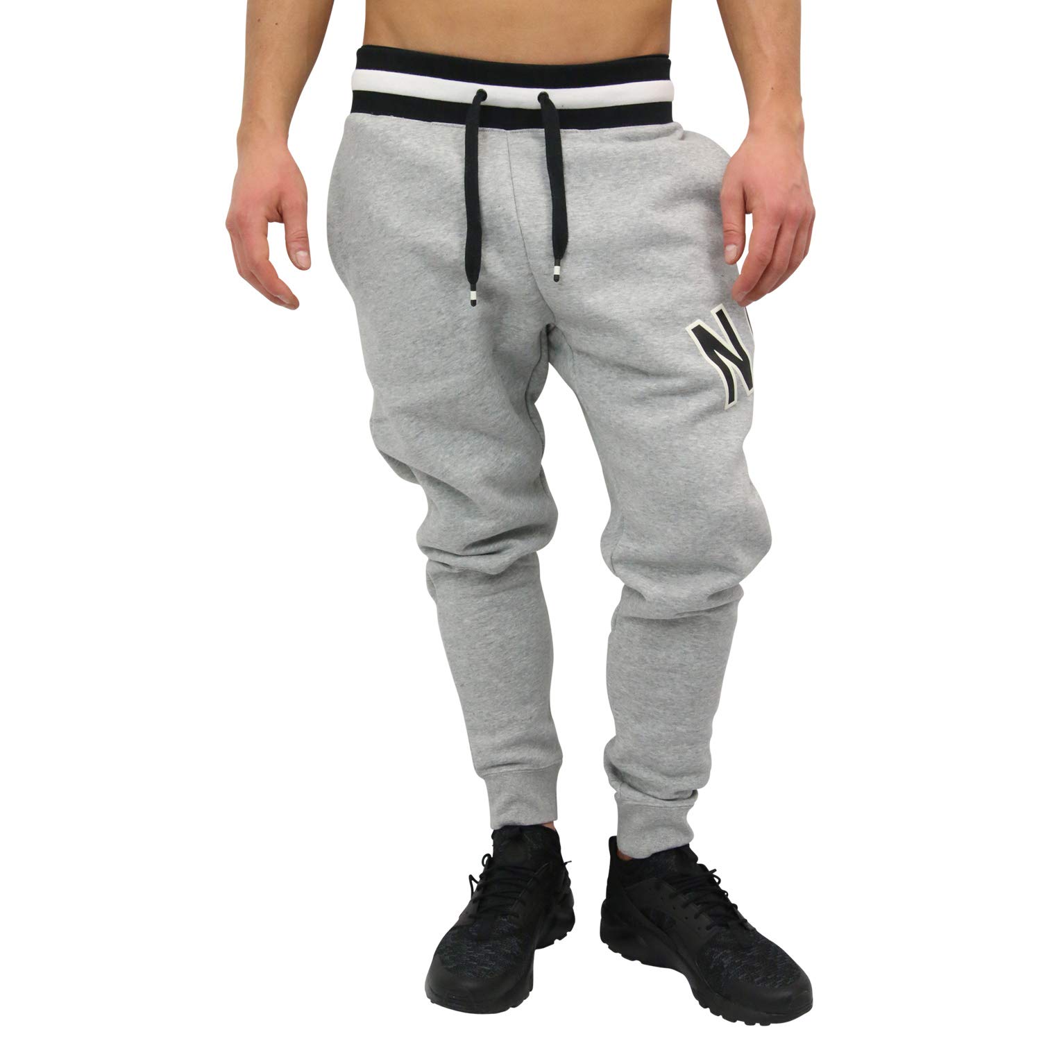 Nike Air Fleece Pants for Men & Women - Comfortable Athletic Joggers with Elastic Waistband - Perfect for Running, Gym Workouts & Lounge Wear