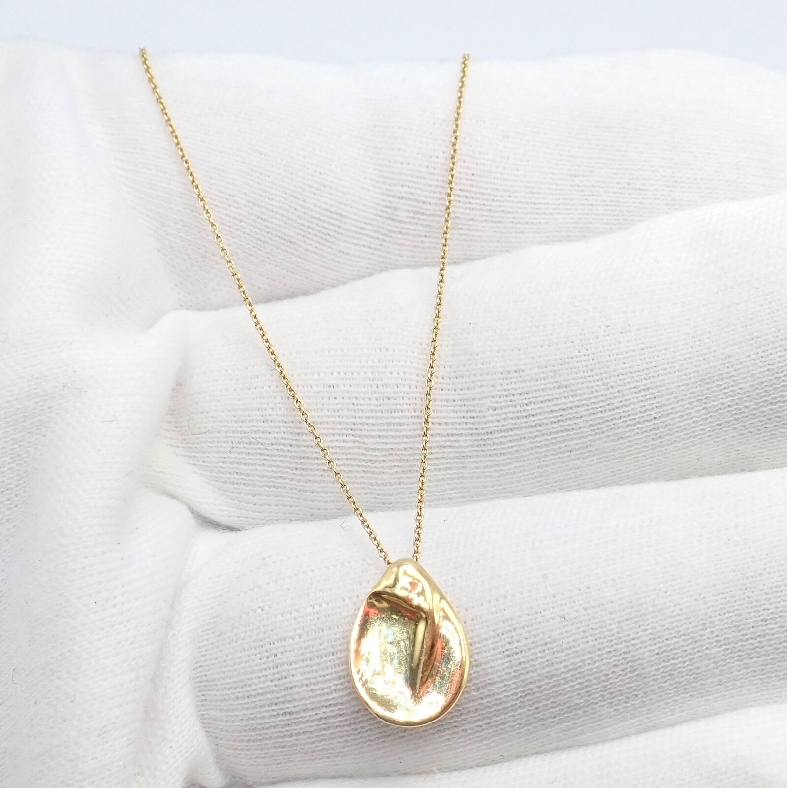 Tiffany & Co Peretti 18k Yellow Gold Madonna Pendant Necklace with Sweet Mini Chain - Elegant Jewelry Gift for Women, Perfect for Weddings, Anniversaries & Special Occasions