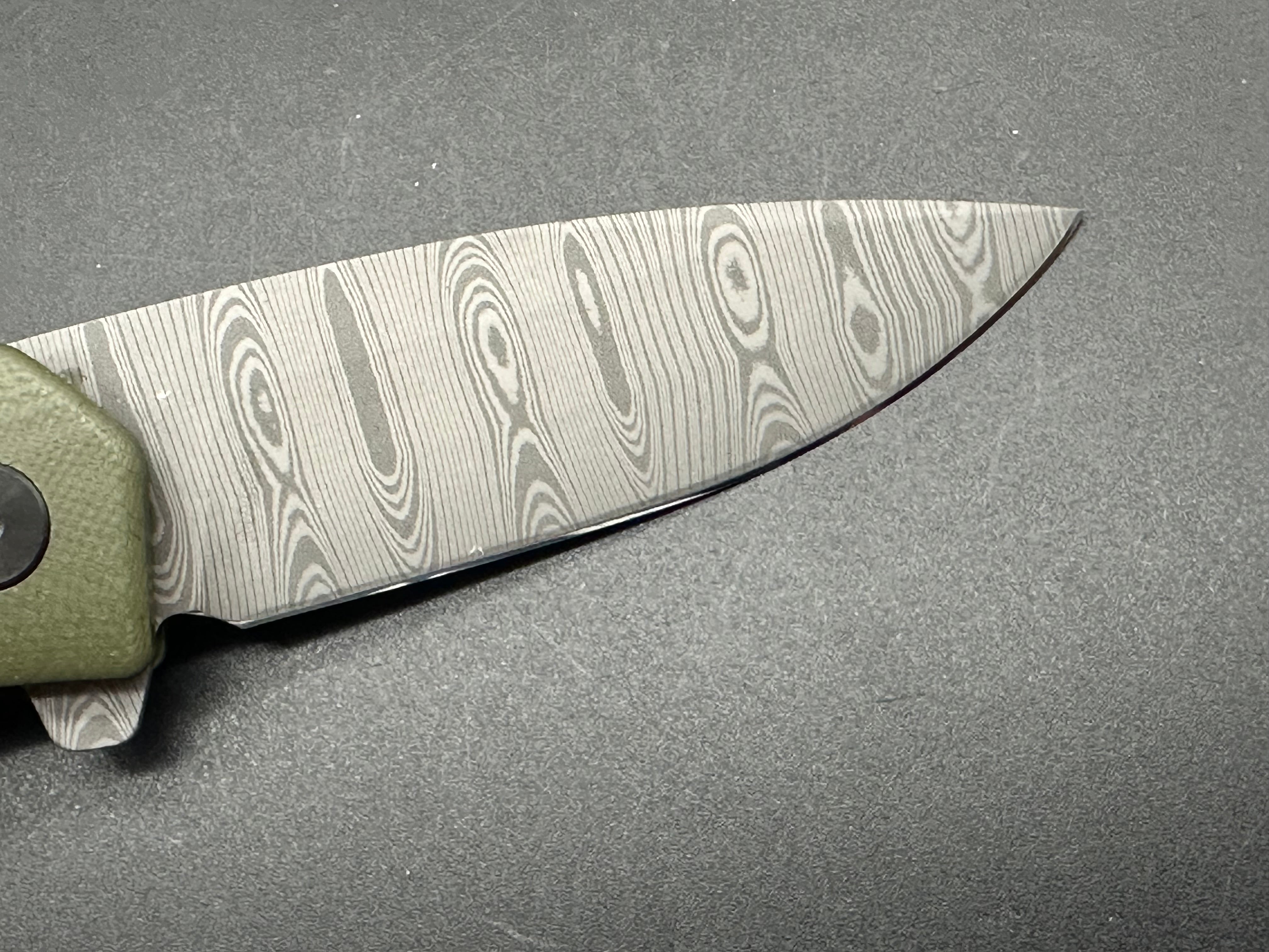 Asher Knives The Spiro Flipper Folding Pocket Knife - OD Green G10 Handle, S35VN Steel Blade, Laser Ladder Damascus Pattern - EDC, Outdoor, Camping, Survival Gear
