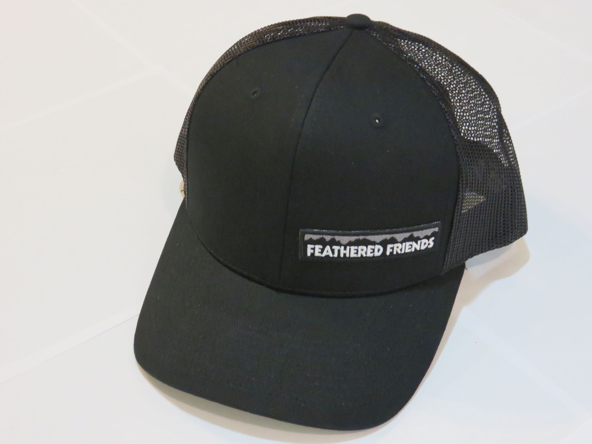 Feathered Friends Pro Style Trucker Offset Mountain Logo Patch Hat - Stylish Adjustable Cap for Outdoor Adventures, Hiking & Casual Wear