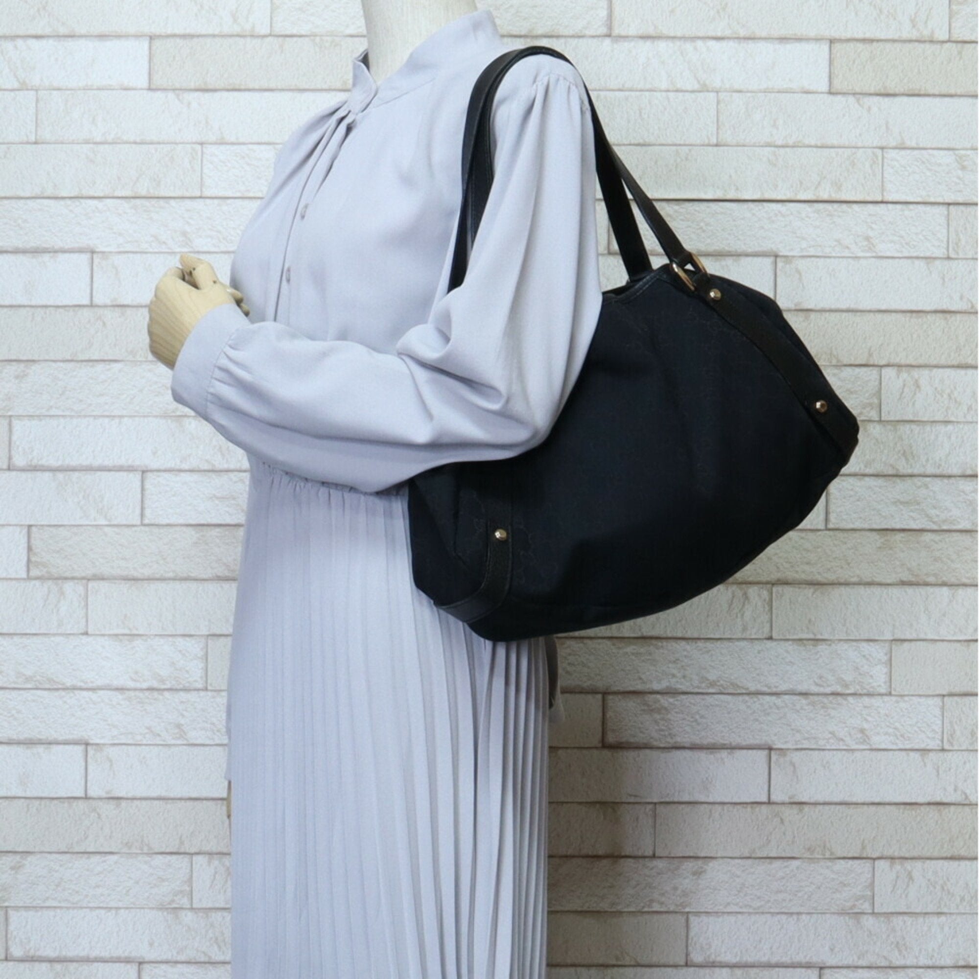 Gucci Black Canvas Shoulder Bag with Adjustable Straps - Stylish Crossbody Purse for Women, Perfect for Work, Travel & Everyday Use