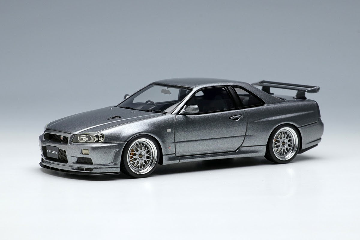 PREORDER Make Up Co., Ltd Eidolon 1:43 Scale Nissan Skyline GT-R (BNR34) V-Spec II 2000 Model Car with BBS LM Wheels in Athlete Silver - Perfect for Diecast Collectors & Japanese Car Enthusiasts
