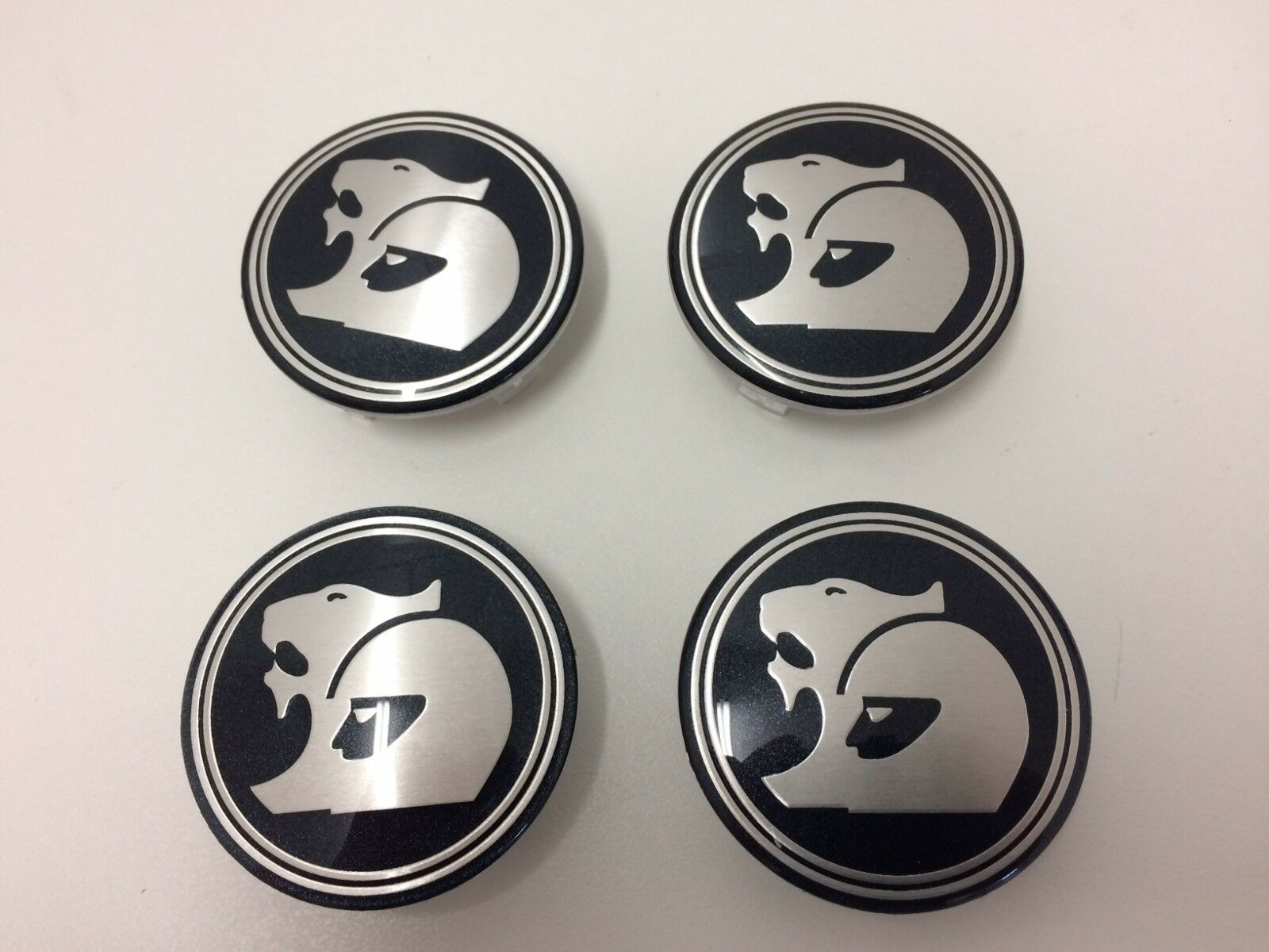 Genuine HSV Wheel Center Caps - Set of 4 for Coupe V2 VY VZ VE VF EX GTS Models | Premium Hub Caps for Car Enthusiasts & Auto Restoration Projects
