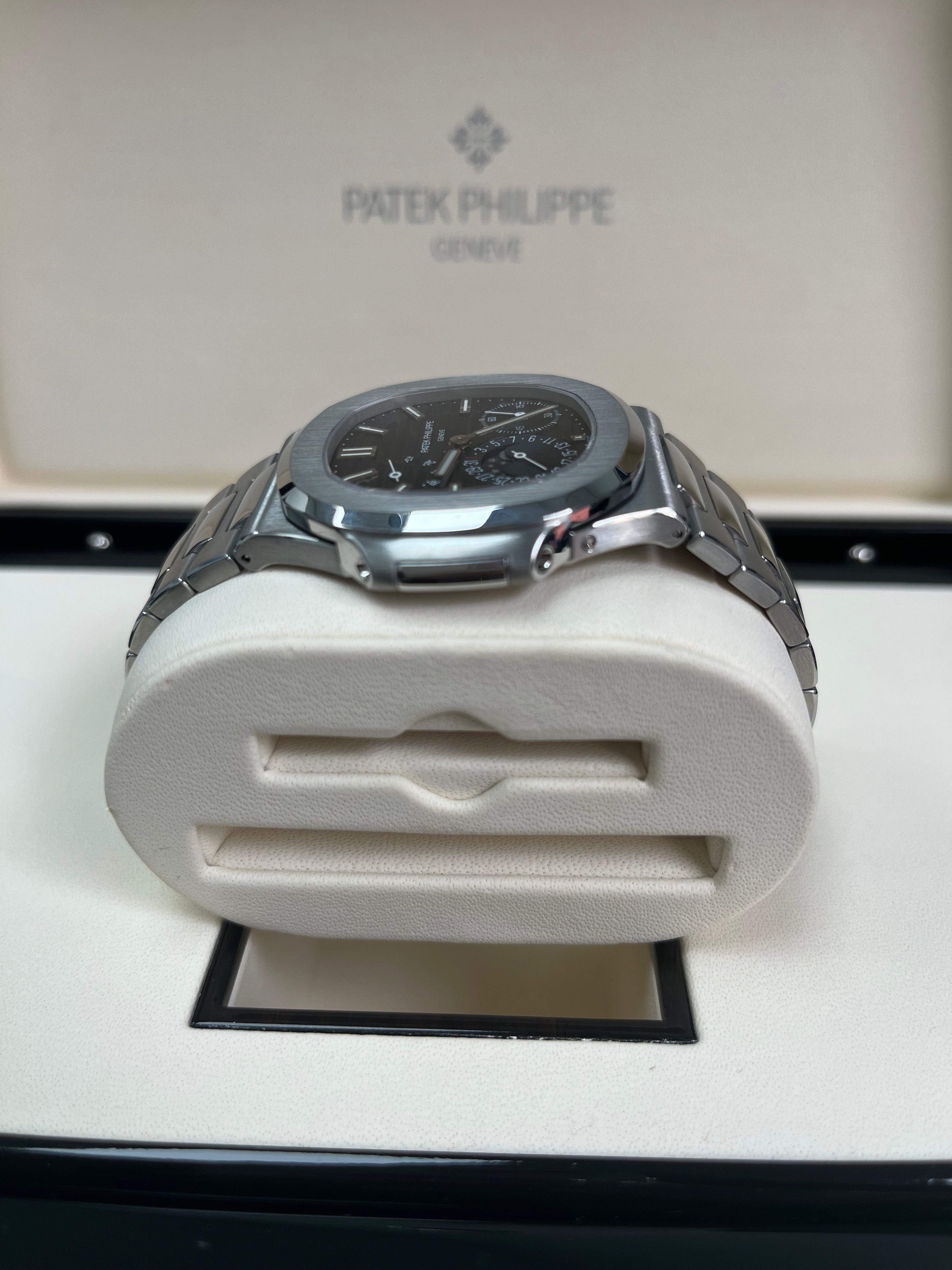 Patek Philippe Nautilus 5712/1A-001 Moon Phase Stainless Steel Watch with Blue Dial - Luxury Men's Timepiece for Business, Gala Events & Collector's Showcase