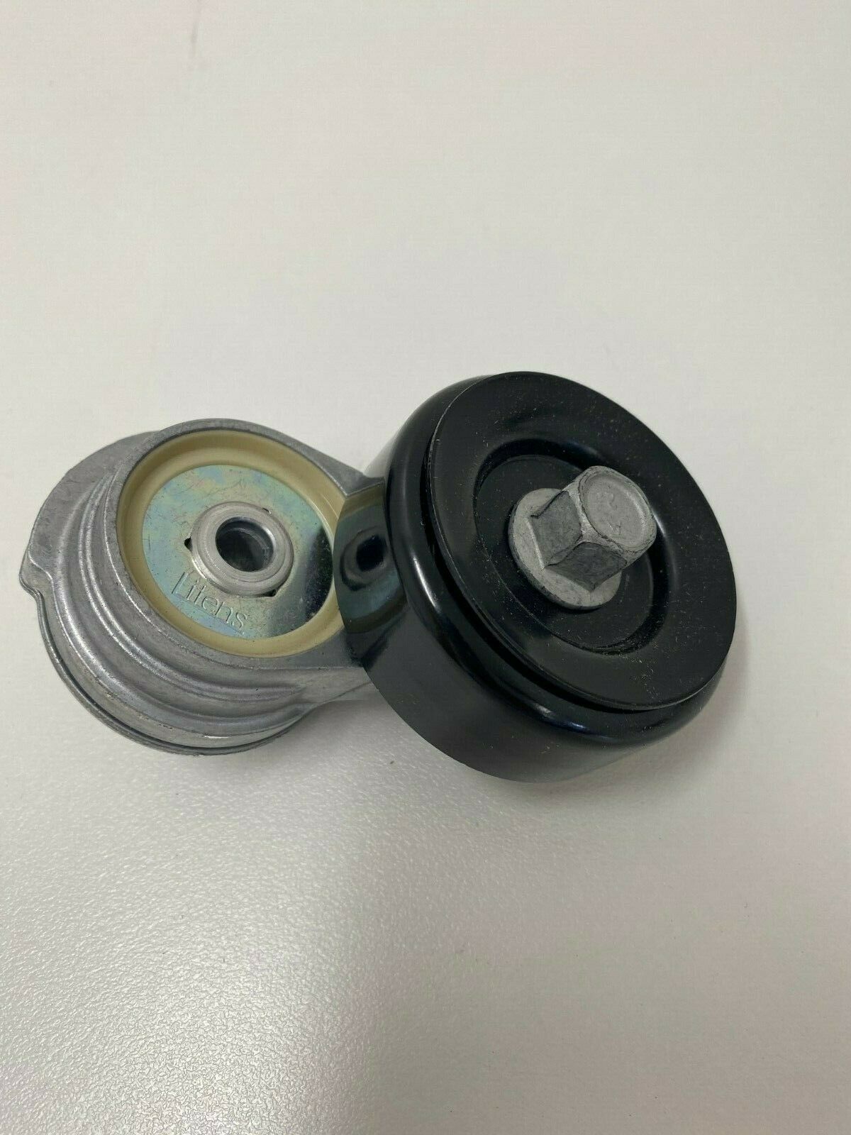 Genuine Holden Commodore Air Conditioning Belt Tensioner Part #92252340 - Perfect for AC System Repair & Maintenance