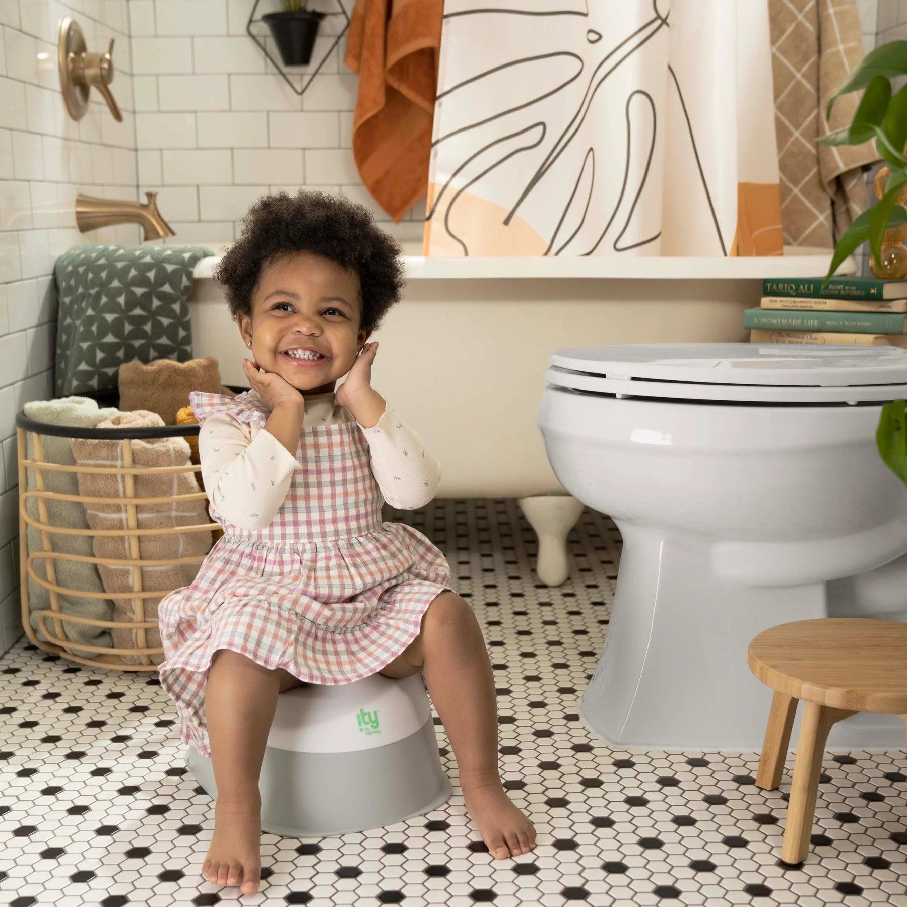 Ingenuity Ready Set Go Potty Training Seat for Babies & Toddlers - Easy-to-Clean, Comfortable & Portable Potty Chair for Boys & Girls - Perfect for Home, Travel & Daycare Use