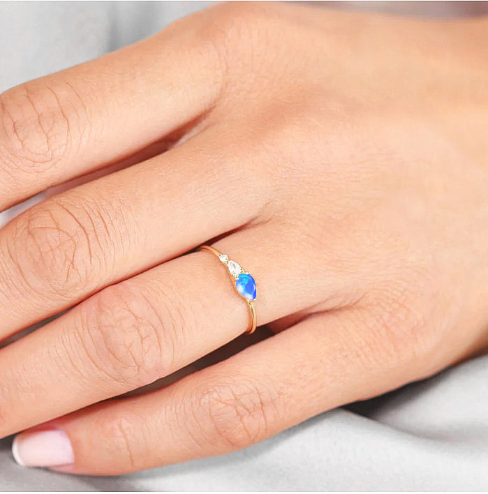 Blue Fire Opal Pear Three Stone Ring – Elegant Jewelry for Women, Perfect for Weddings, Anniversaries & Special Occasions