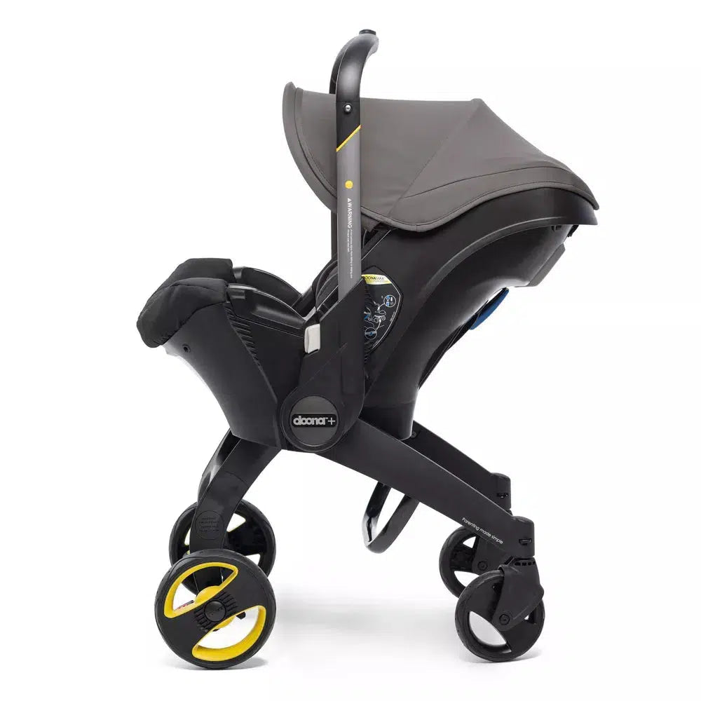 Doona Infant Car Seat & Stroller Combo with Base - Grey Hound | Lightweight Travel System for Newborns | Perfect for Airports, Shopping & Daily Outings