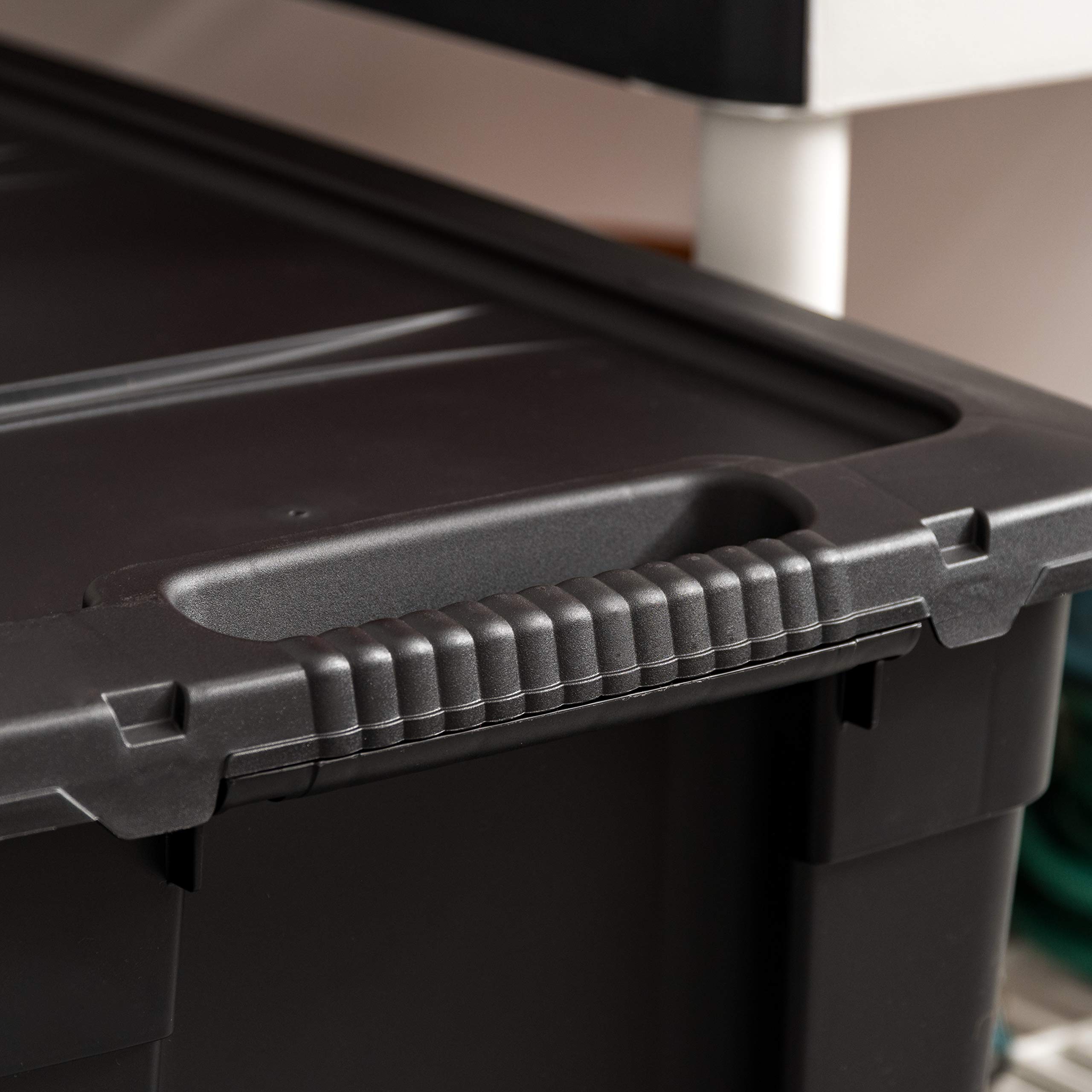 31 Gallon Heavy Duty Storage Totes with Easy-Grip Handles - 4 Pack Stackable Utility Bins with Lids | Durable Garage Organization Containers | Made in USA (Black) | Perfect for Home, Office & Warehouse Storage Solutions