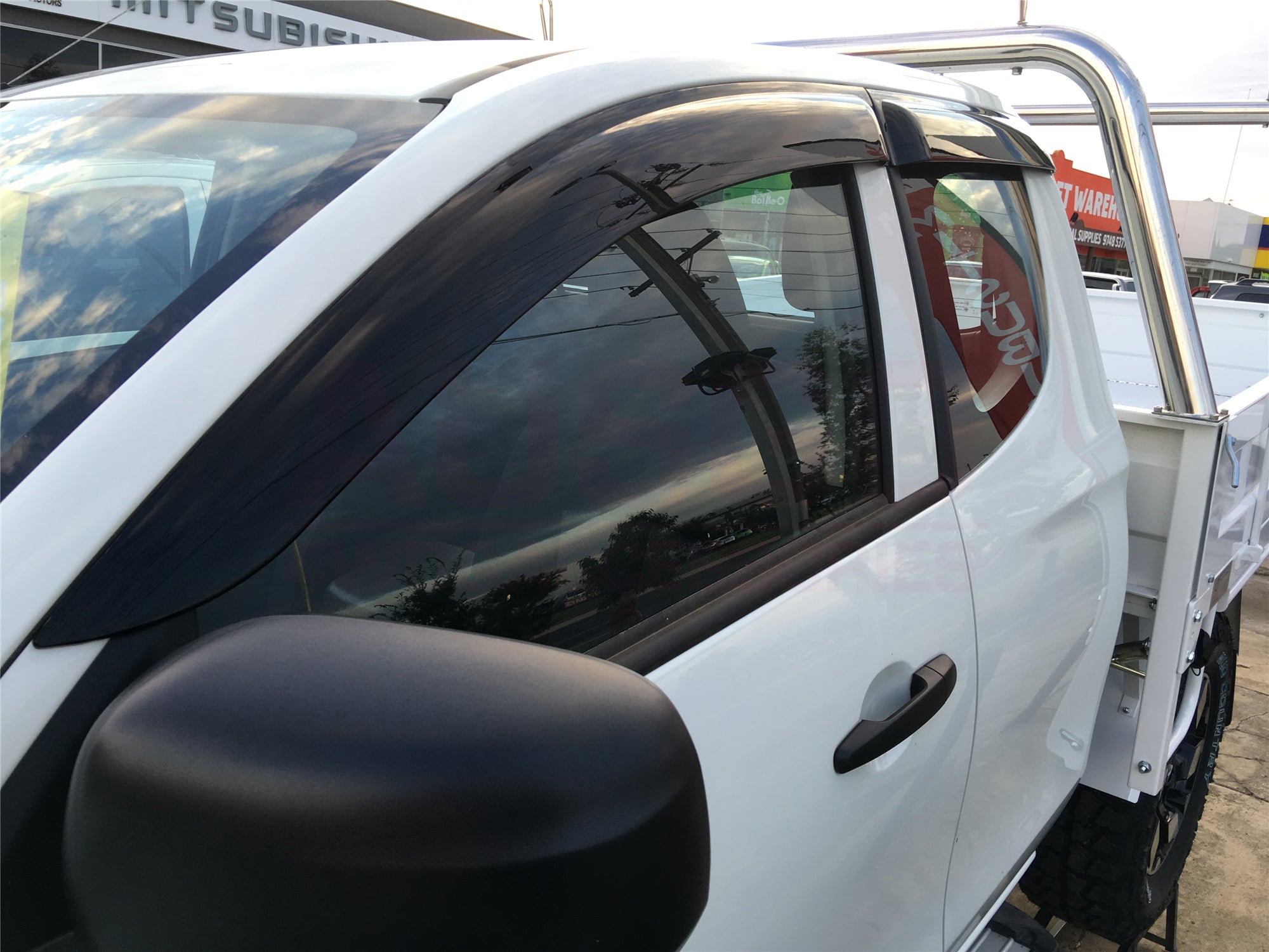 **Mitsubishi Triton MQ MR Extra Cab (2015-2024) Weather Shields - Durable Injection Molded Rain Guards for All-Weather Protection - Perfect for Off-Roading & Daily Commuting**