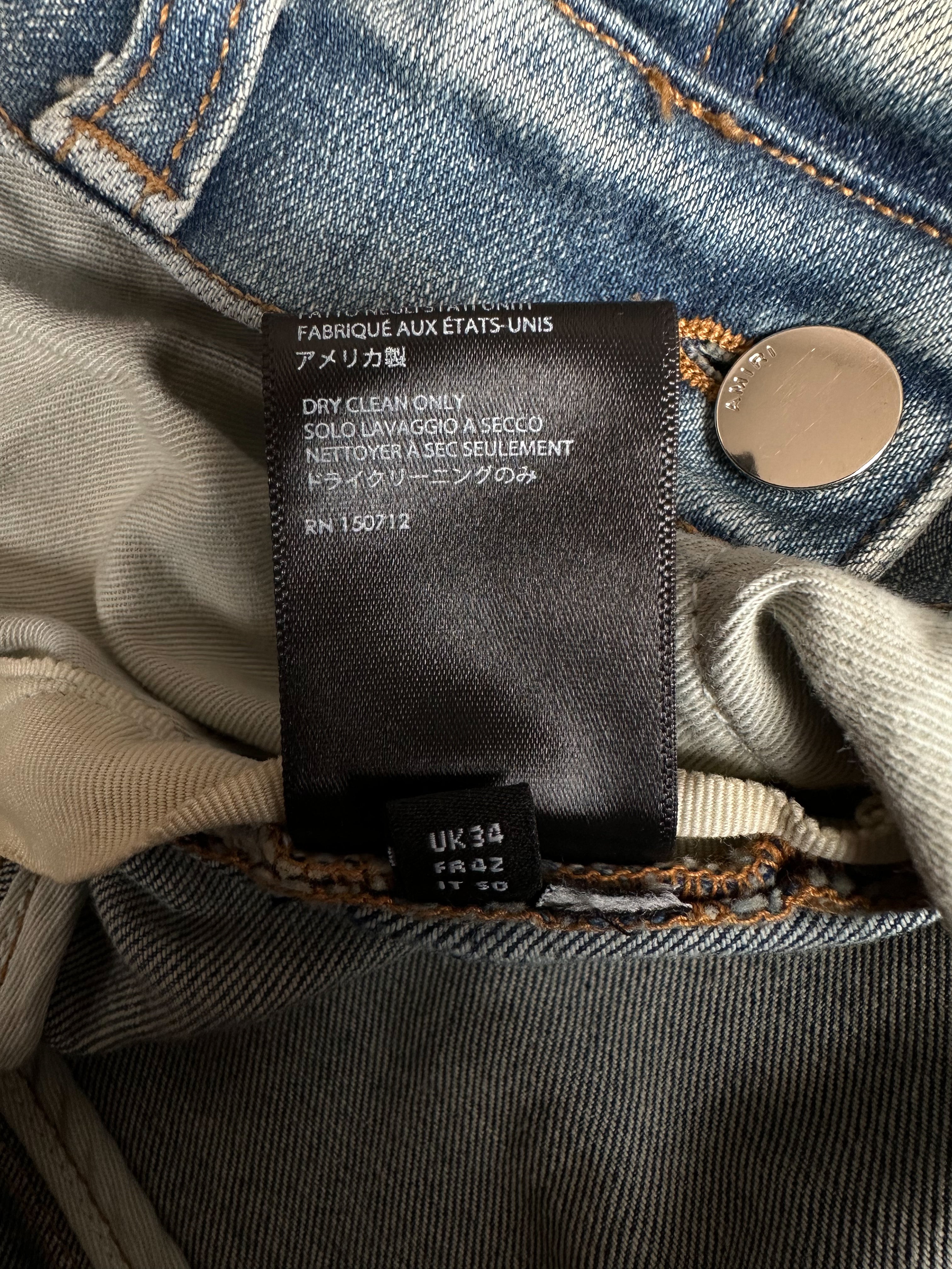 Amiri Blue & Black Bandana Patch MX1 Distressed Denim Jeans for Men - Stylish Ripped Skinny Jeans for Casual Wear & Street Fashion