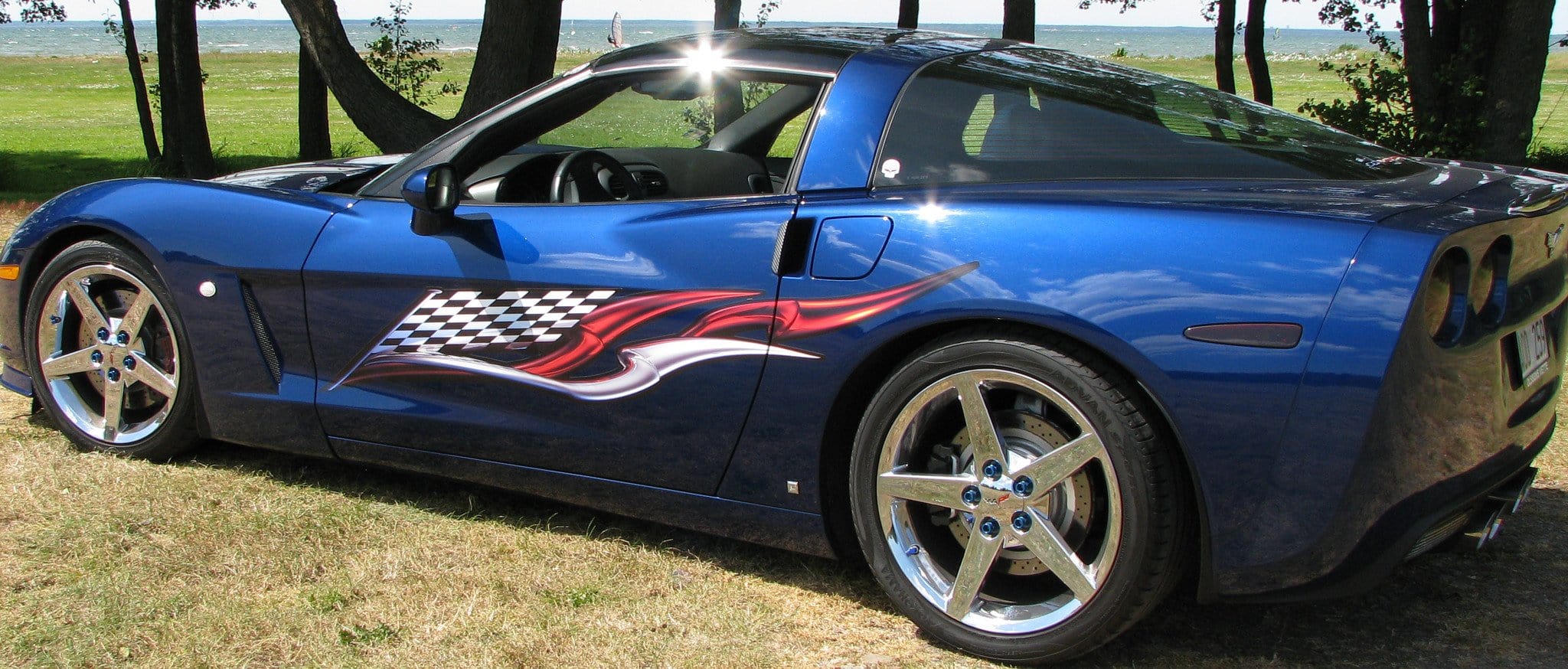 Checkered Flag Racing Decals - High-Quality Vinyl Graphics for Cars, Trucks & Motorcycles | Perfect for Racing Enthusiasts & Auto Shows