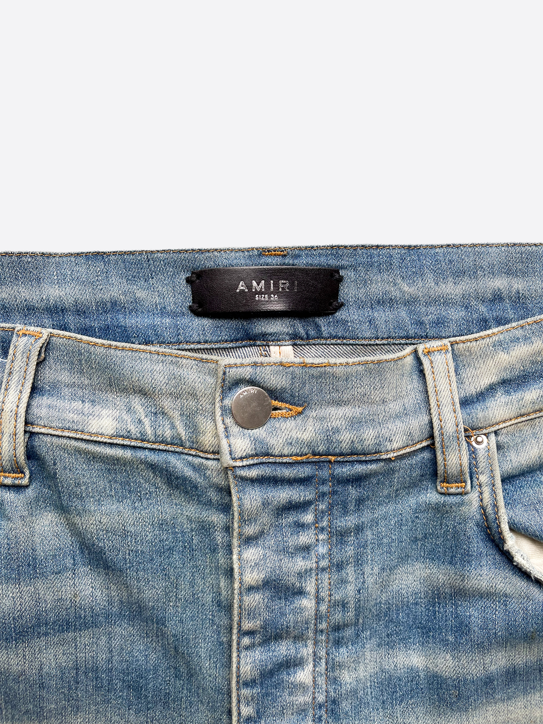 Amiri Military Camo Patch Jeans for Men - Distressed Denim Pants with Camouflage Design | Perfect for Streetwear & Casual Outfits