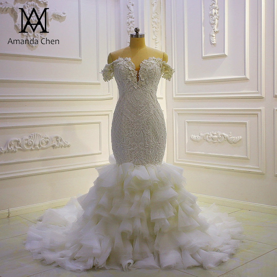 Elegant Off Shoulder Lace Appliqued 3D Flowers Tiered Mermaid Wedding Dress AM1051 - Perfect for Beach, Destination, and Boho Chic Weddings