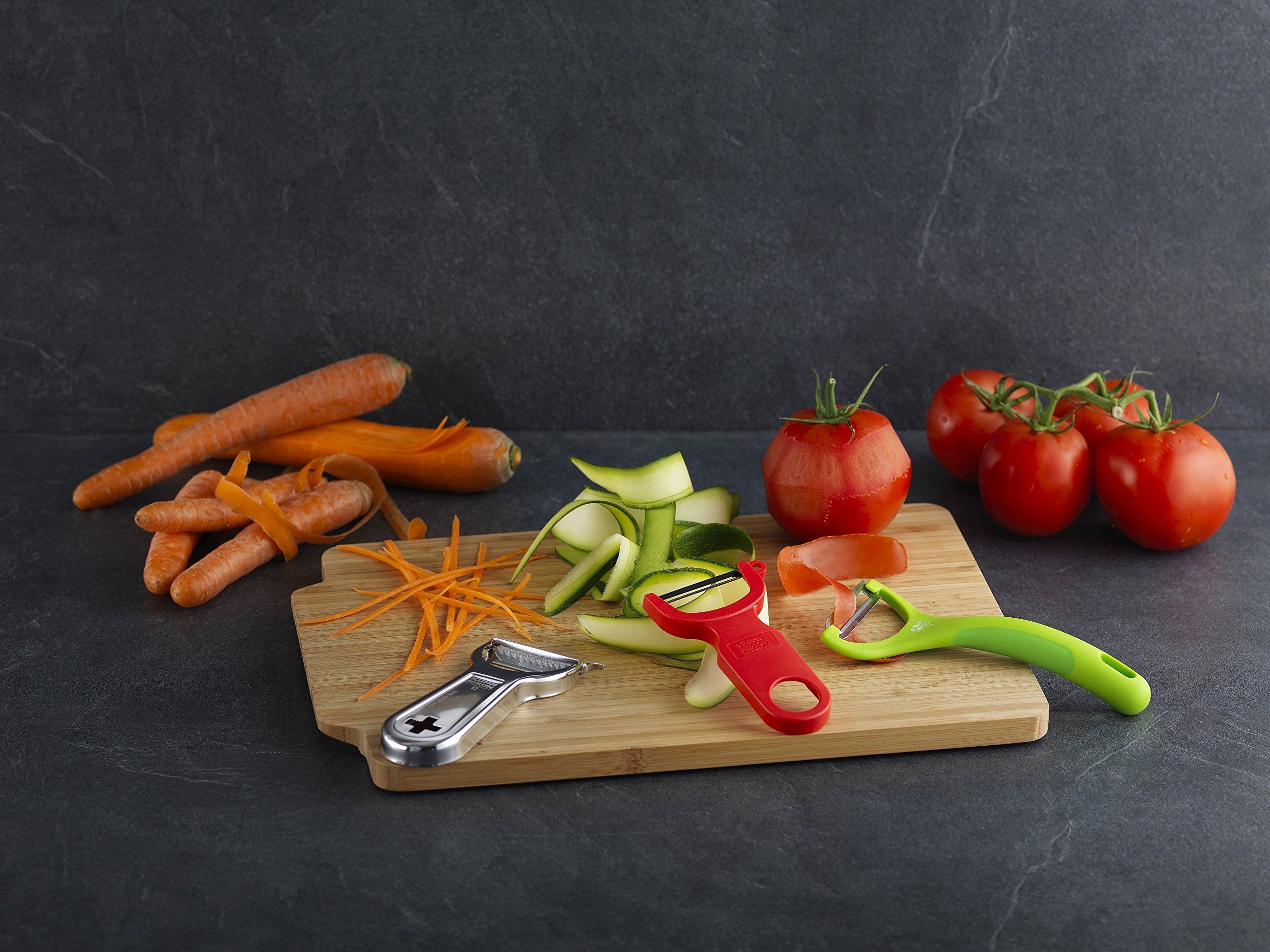 Kuhn Rikon Piranha Swivel Peeler - Sharp Stainless Steel Blade, Ergonomic Handle, Red - Perfect for Peeling Fruits & Vegetables in Kitchen
