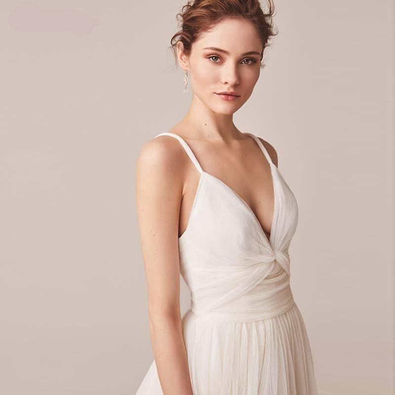 Elegant Spaghetti Straps Tulle V-Neck Backless Wedding Dress for Brides - Perfect for Beach Weddings, Vow Renewals & Romantic Photoshoots
