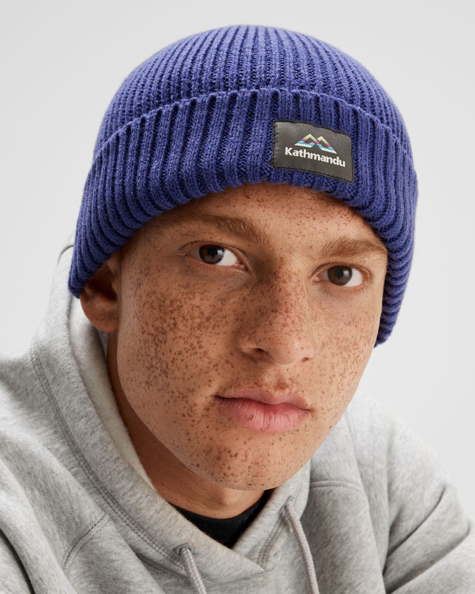 Kathmandu Horizon Line Badge Beanie - Warm Winter Knit Hat for Men & Women - Perfect for Skiing, Hiking, and Outdoor Adventures