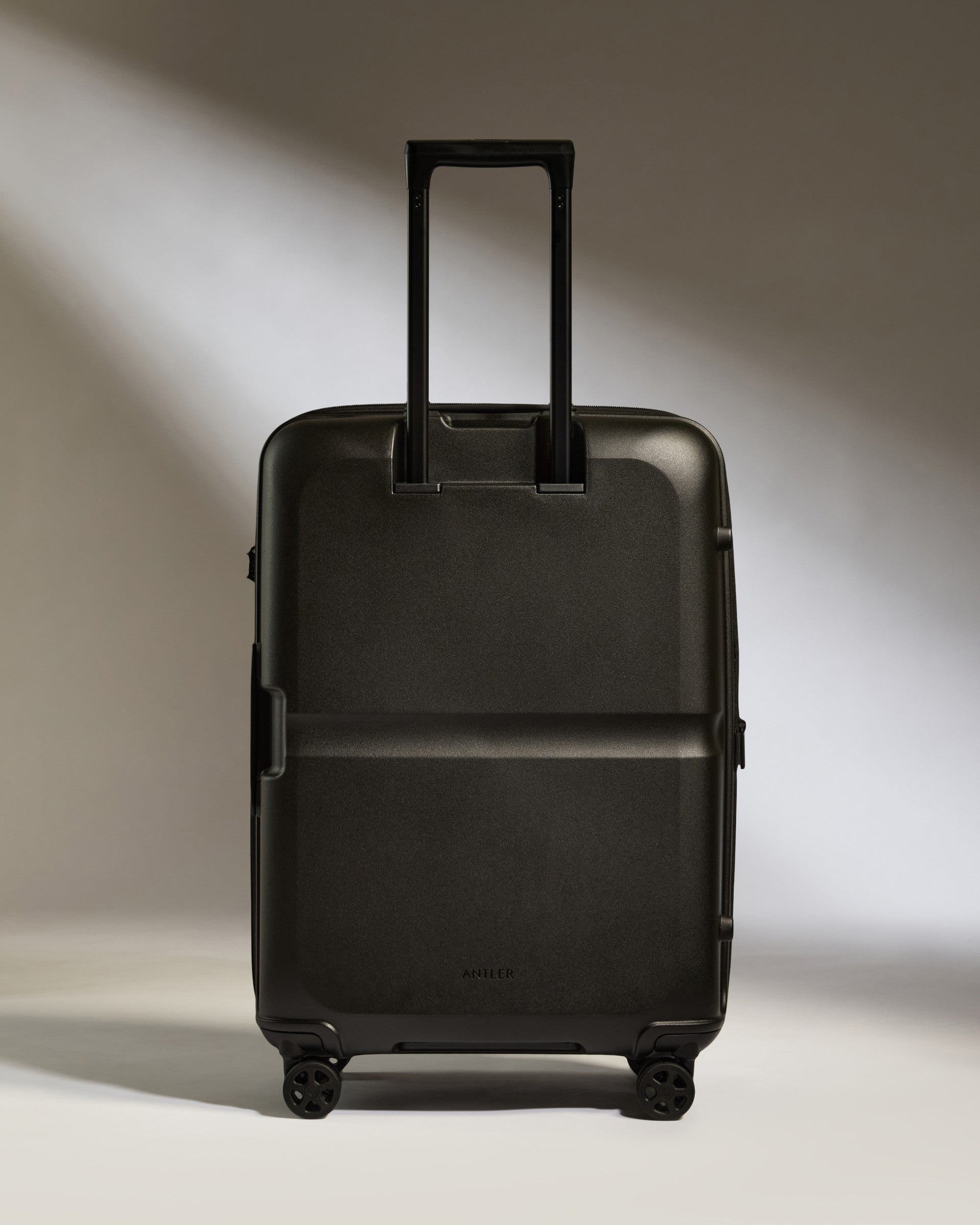 Medium Black Luggage with Single Stripe - Perfect for Business Travel & Weekend Getaways