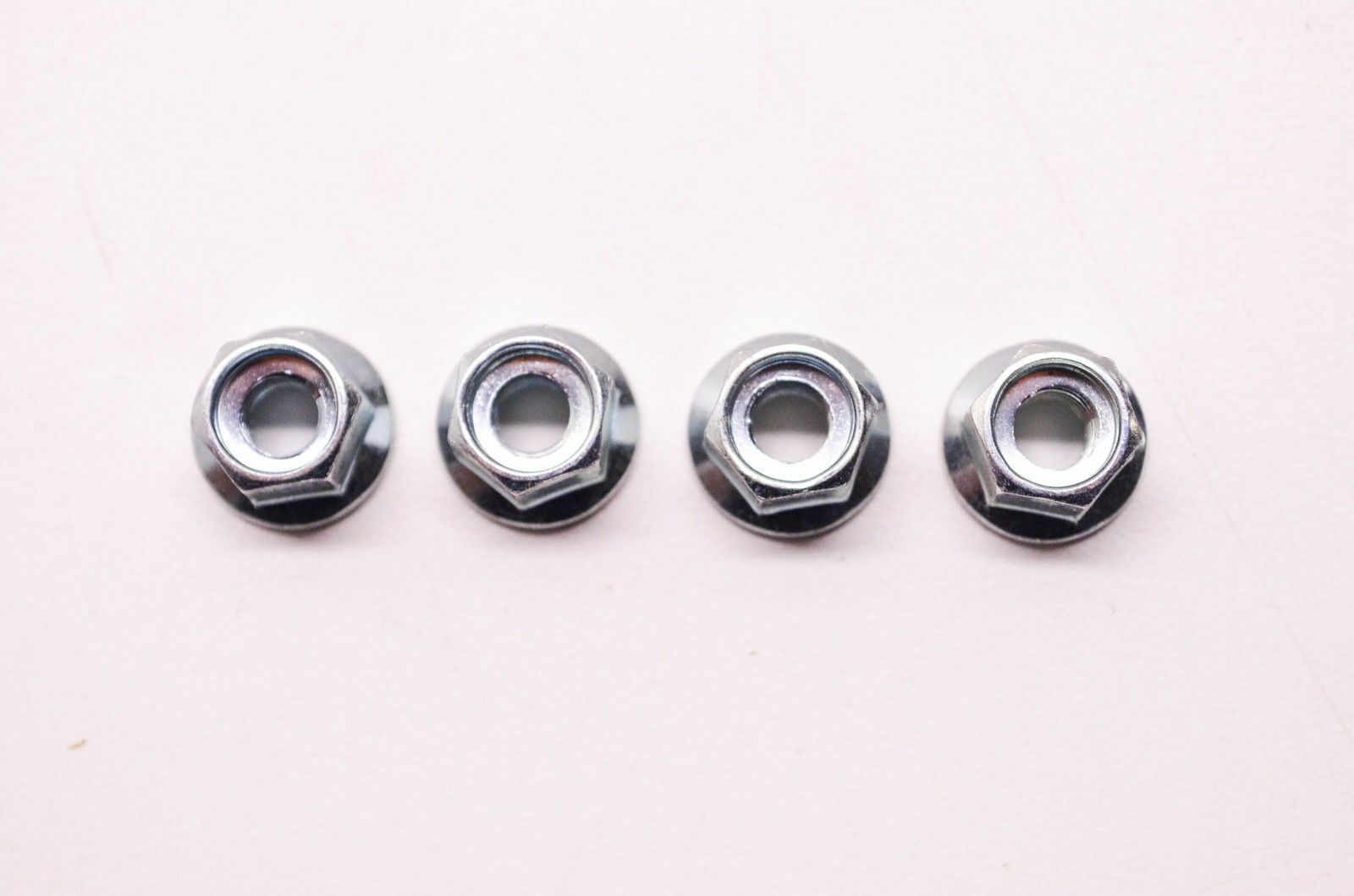 Genuine Echo Bar Nuts (4-Pack) - Compatible with Echo Chain Saws - Durable Replacement Parts for Forestry and Woodcutting Tasks