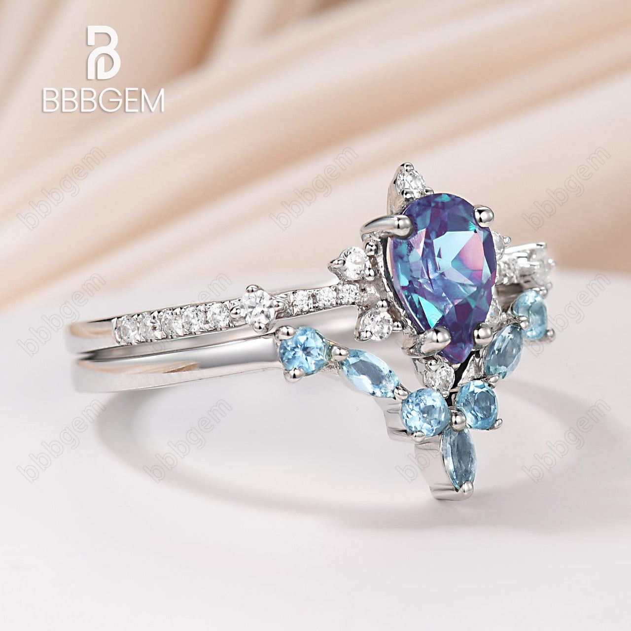 Exquisite Pear Cut Alexandrite Engagement Ring with Curved Topaz Matching Band - Perfect for Proposals, Anniversaries & Special Occasions