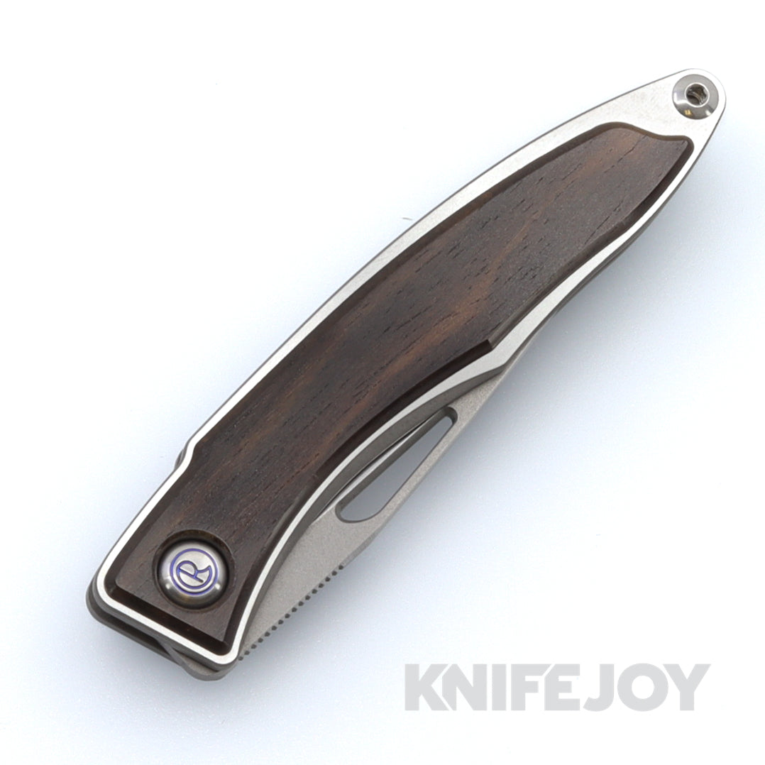 Chris Reeve Knives Mnandi Folding Knife - Magnacut Clip Point Blade, Titanium Handles with Macassar Ebony Inlay - Perfect for EDC, Outdoor Adventures & Collectors