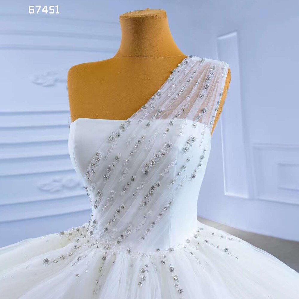 Luxury White One Shoulder Beaded Lace Wedding Dress - Serene Hill Custom Made Bride Gown for Dubai Weddings & Formal Events 2025 (Style HM67451) | Perfect for Beach Weddings, Red Carpet Events & Anniversary Celebrations