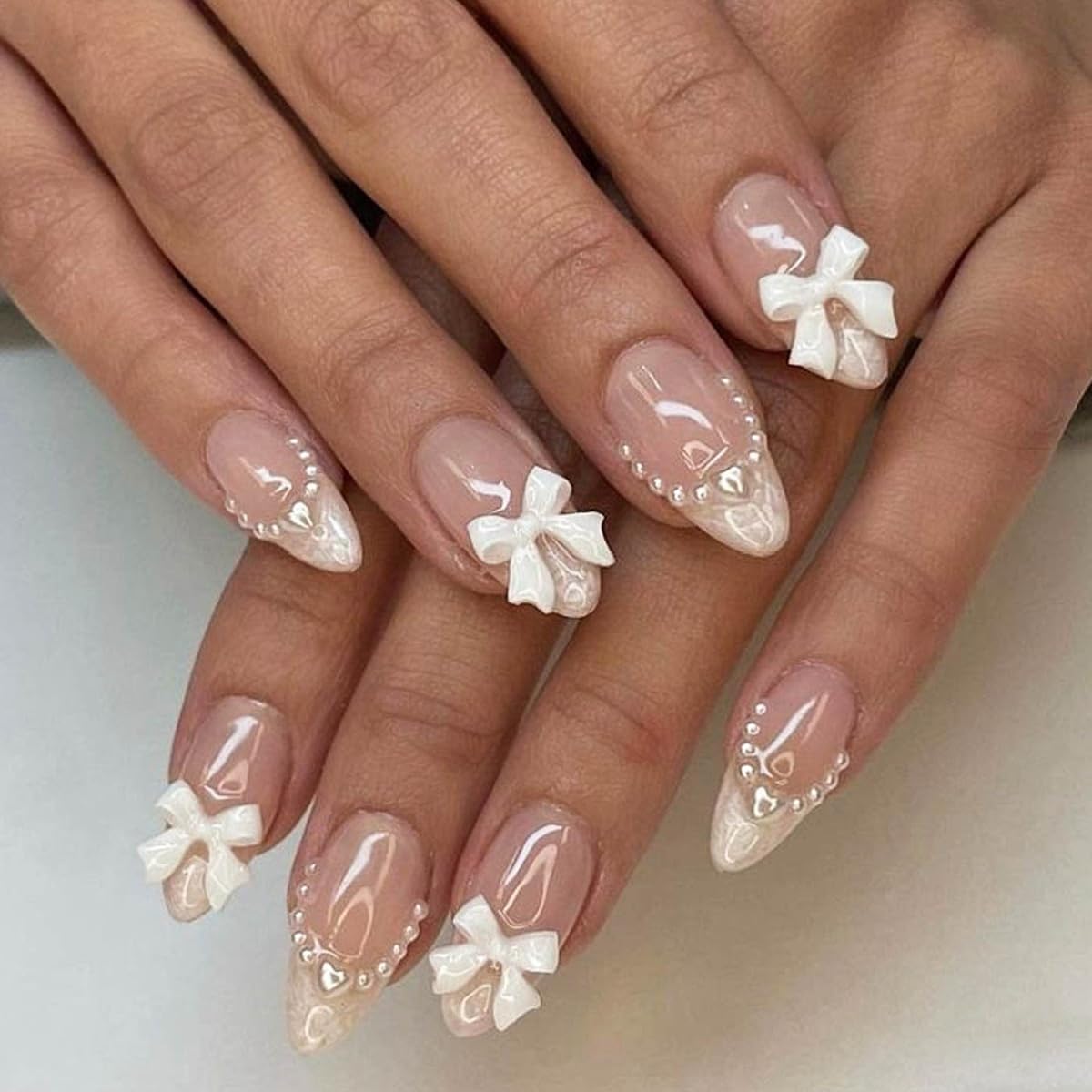 French Tip Press On Nails - 24Pcs Almond Pink Fake Nails with Medium French Pearls & White Bow Nail Charms | Elegant Manicure for Parties, Weddings & Special Occasions