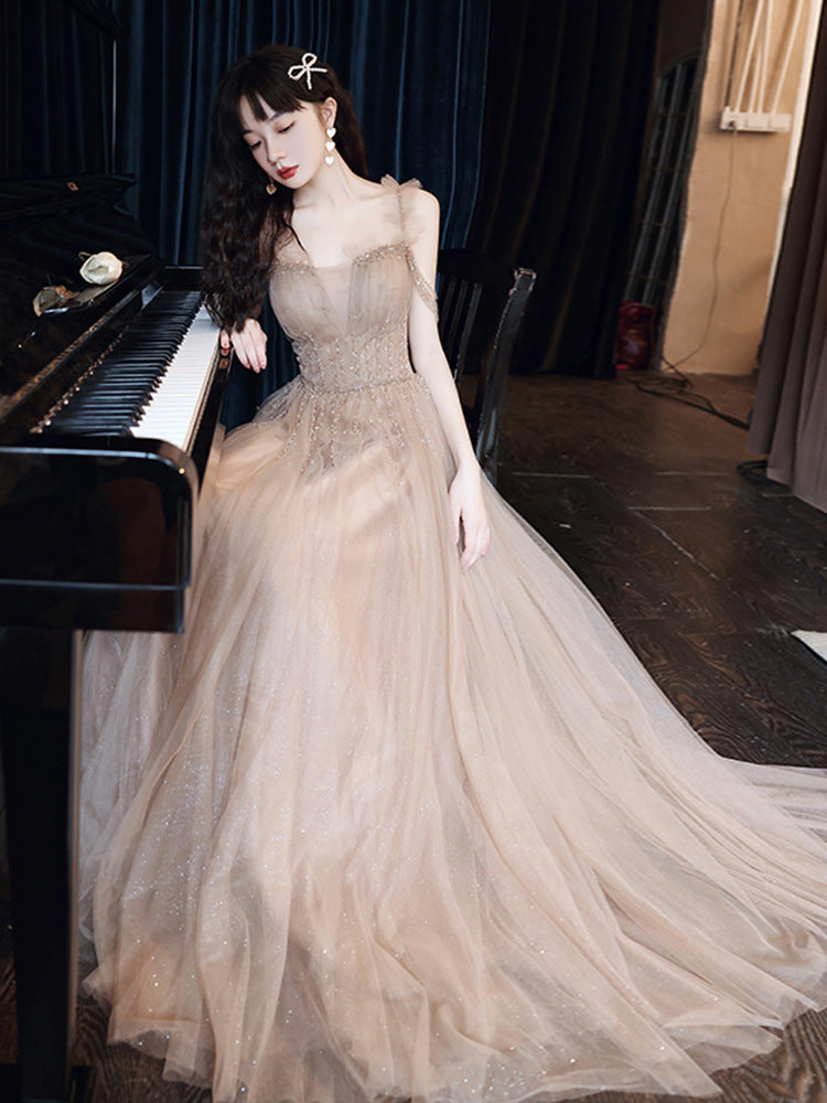 Elegant Champagne A-Line Tulle Prom Dress with Spaghetti Straps - Formal Evening Gown for Homecoming, Wedding, and Special Occasions - Style 307