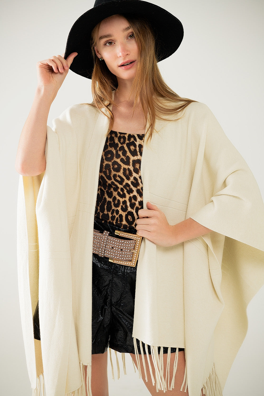 Soft Knit Beige Poncho with Fringe - Cozy & Stylish Women's Outerwear for Fall & Winter, Perfect for Casual Outings, Travel, and Layering