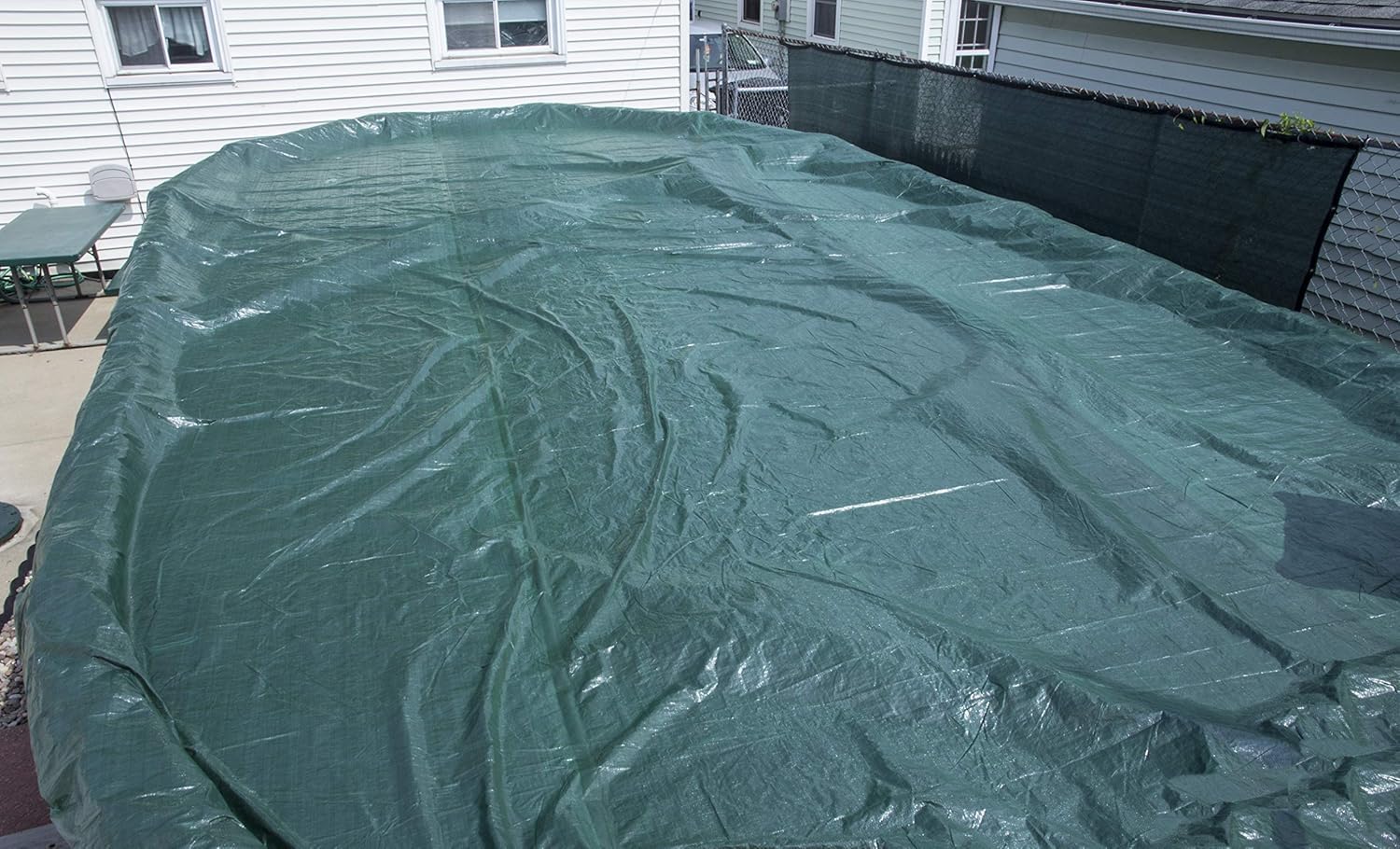 Buffalo Blizzard Supreme Winter Cover for 16x32 ft Oval Above Ground Pools | Heavy Duty Reversible Green/Black | 4 ft Extra Material with Wind Guard Clips | Perfect for Winter Protection & Snow Load Resistance in Cold Climates