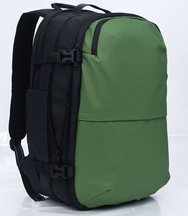Travelite 17.3 Inch Vacuum Compression Travel Backpack with Hand Pump - Lightweight Green Carry-On Luggage for Airplane, Camping & Outdoor Adventures