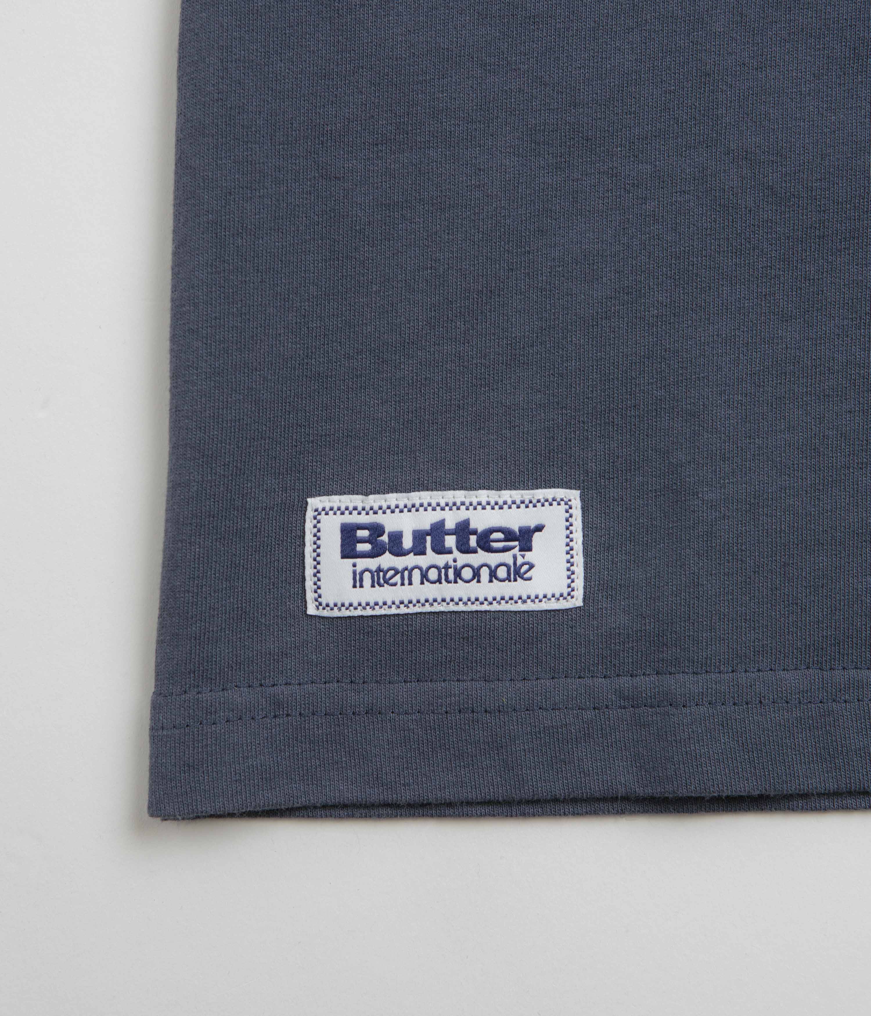 Butter Goods Movement Graphic T-Shirt - Vintage Denim Style - Casual Streetwear for Men & Women | Perfect for Everyday Wear, Street Fashion, and Urban Outfits