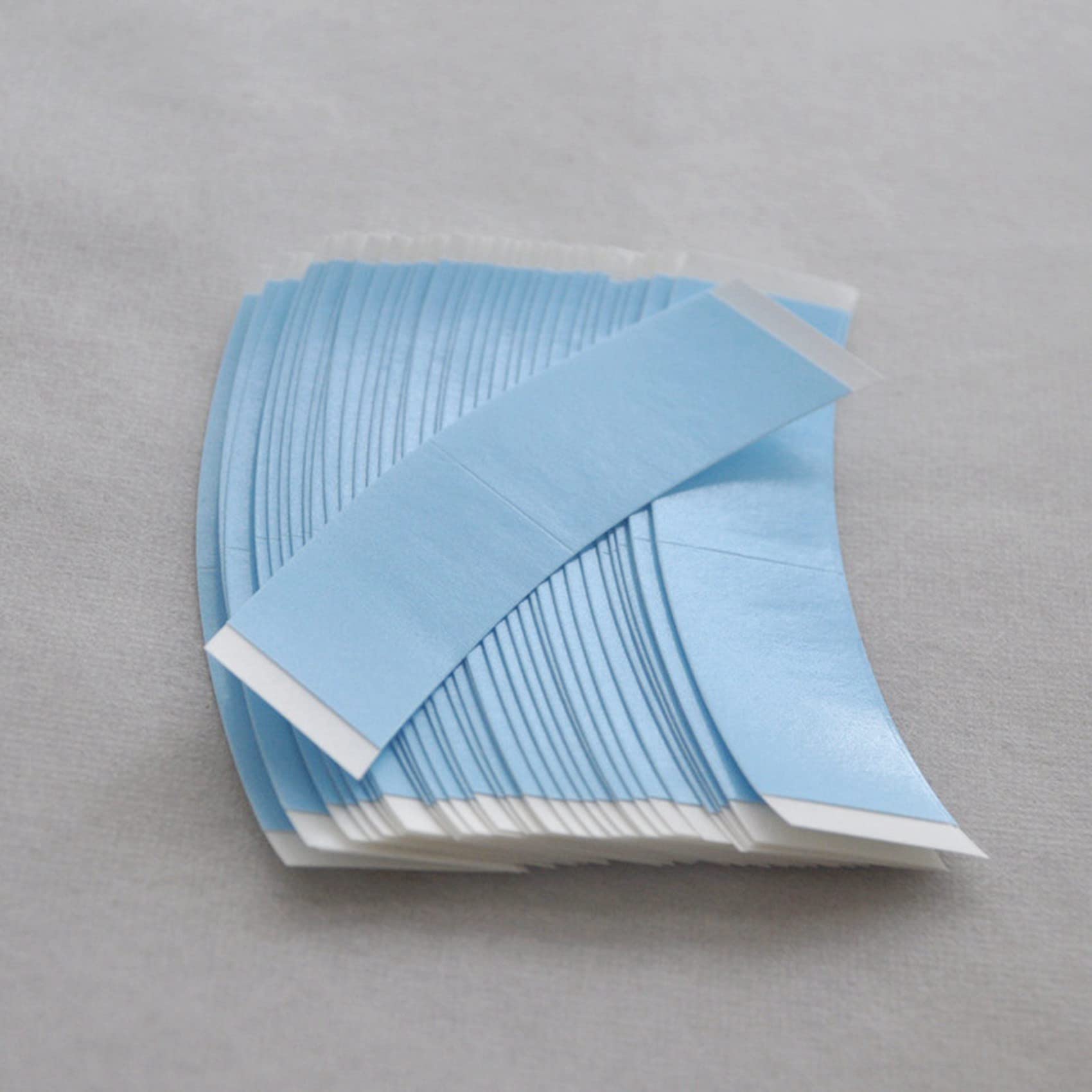 Grockstr 144Pcs Double Sided Tape - Strong Adhesive Wig Tape for Toupee & Lace Wigs | Blue Arc Tape for Secure Hold | Perfect for Cosplay, Daily Wear & Hair Extensions
