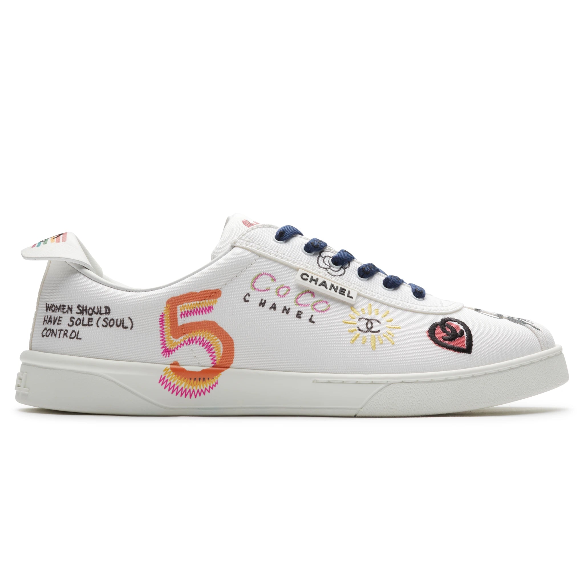 Chanel x Pharrell White Canvas Sneakers - Authentic Pre-Owned Luxury Shoes for Men | Streetwear Fashion, Casual Wear & Collector's Item