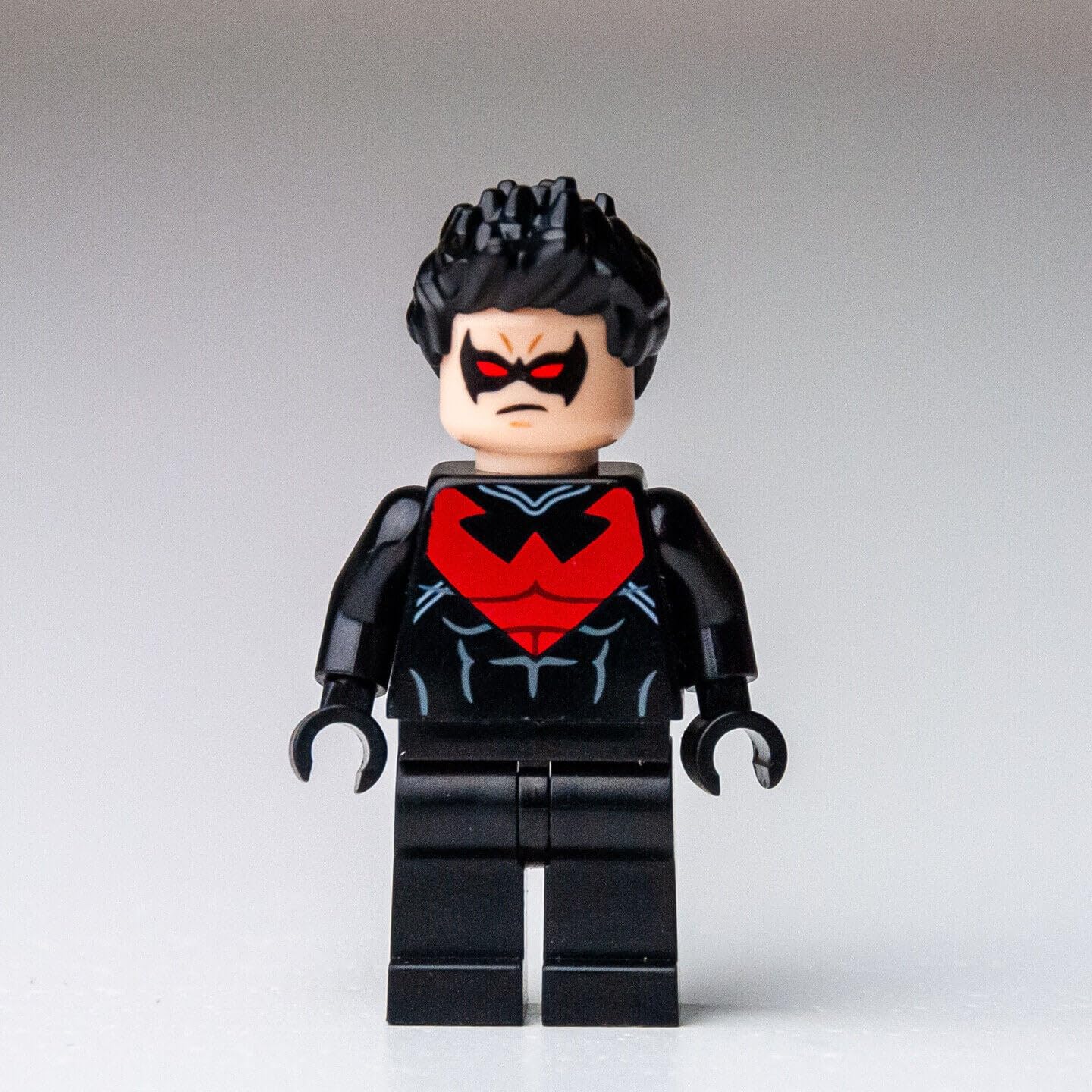 LEGO Nightwing Minifigure (Red Version) with 2 Red Baton Weapons - Collectible DC Superhero Building Toy for Kids & Adults - Perfect for Display, Role Play, and LEGO Batman Collection