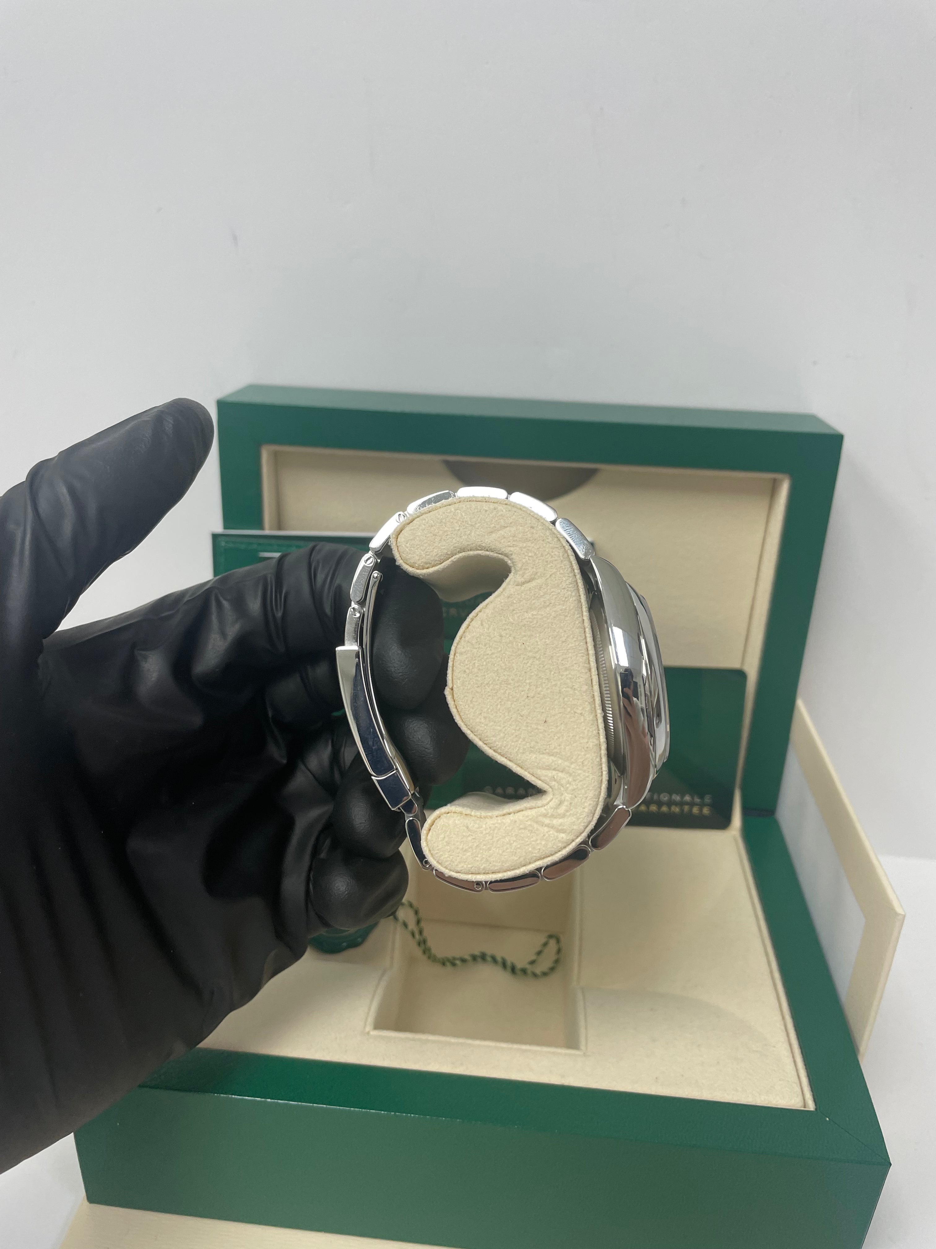 Rolex Oyster Perpetual 41mm Men's Watch - Stainless Steel Case, Turquoise Blue Dial, Oyster Bracelet (Ref# 124300) | Luxury Dress Watch for Business & Formal Occasions