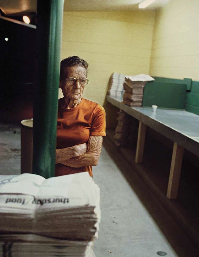 Nathan Benn Editioned Print - Part Time Worker E.M. Souder Waiting for Newspapers at St. Pete Times Plant, 3 AM, St. Petersburg 1981 | Vintage Photography, Office Decor, Art Collector's Piece