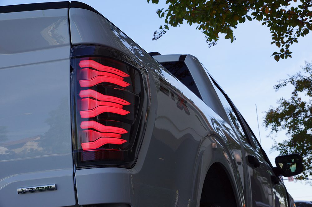 21 23 Ford F150 LUXX Series LED Tail Lights - Black & Red Smoked Lens - High Performance Brake Lights for Pickup Trucks - Perfect for Night Driving & Off-Road Adventures