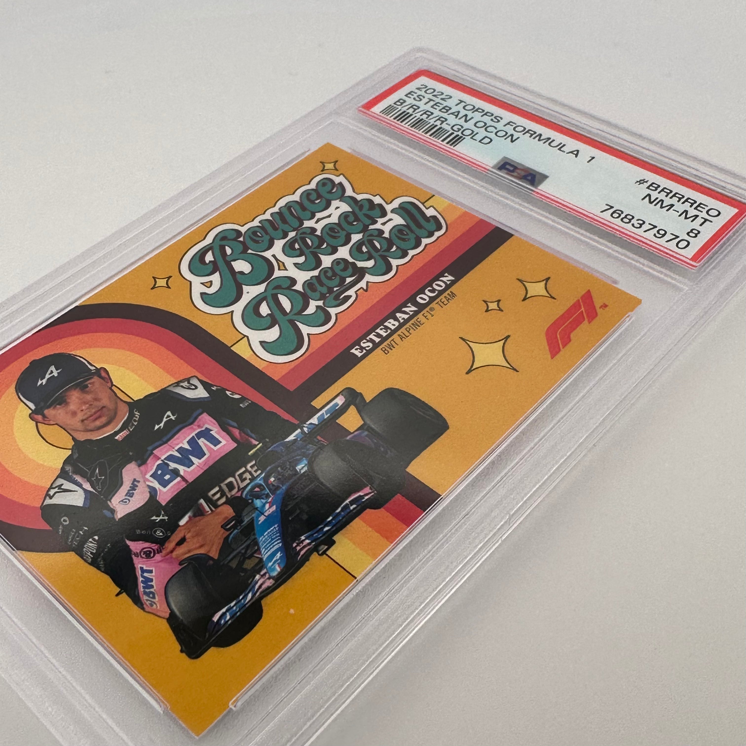 PSA 8 Graded 14/50 Esteban Ocon #BRRREO Bounce Rock Race Roll Gold Parallel - Perfect for Racing Fans & Collectors, Display in Home or Office