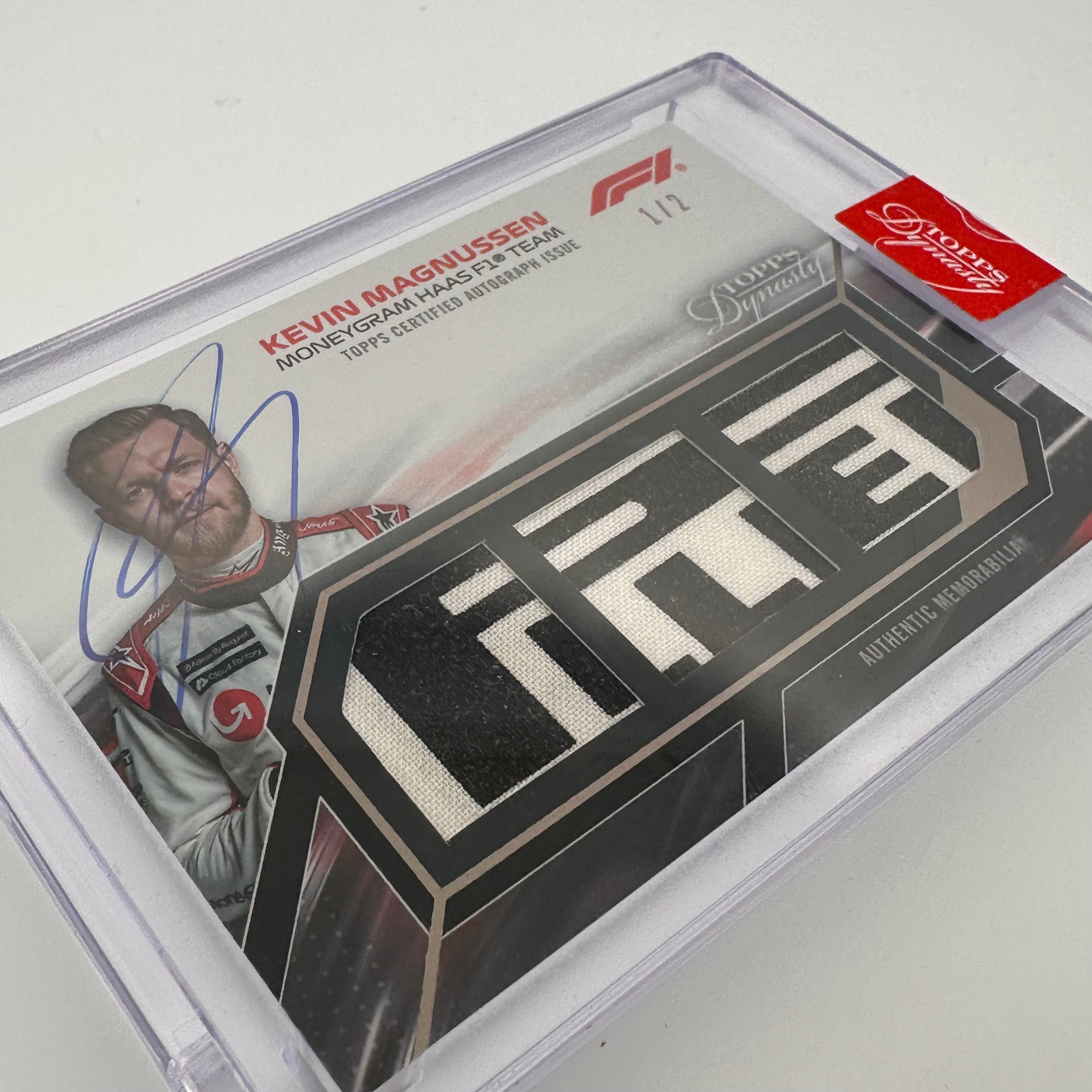 2023 Topps Dynasty F1 Kevin Magnussen #SDTRA KMII Triple Relic Autograph Card - Collectible Memorabilia for F1 Fans and Sports Card Enthusiasts