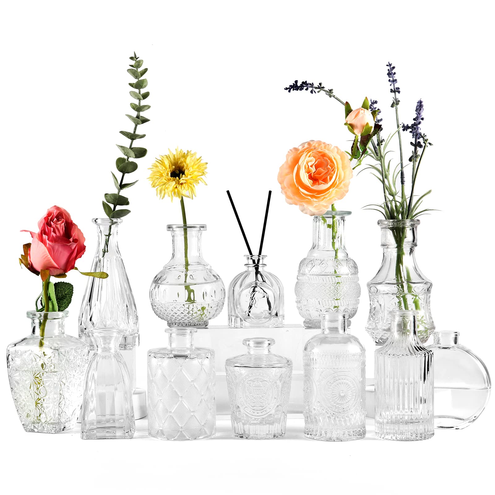 BIGIVACA Set of 12 Small Clear Glass Bud Vases - Mini Flower Vases for Wedding Centerpieces, Rustic Home Decor, Table Arrangements - Vintage Embossed Style Glass Bottles for Wedding, Party, Dining Table & Office Decor