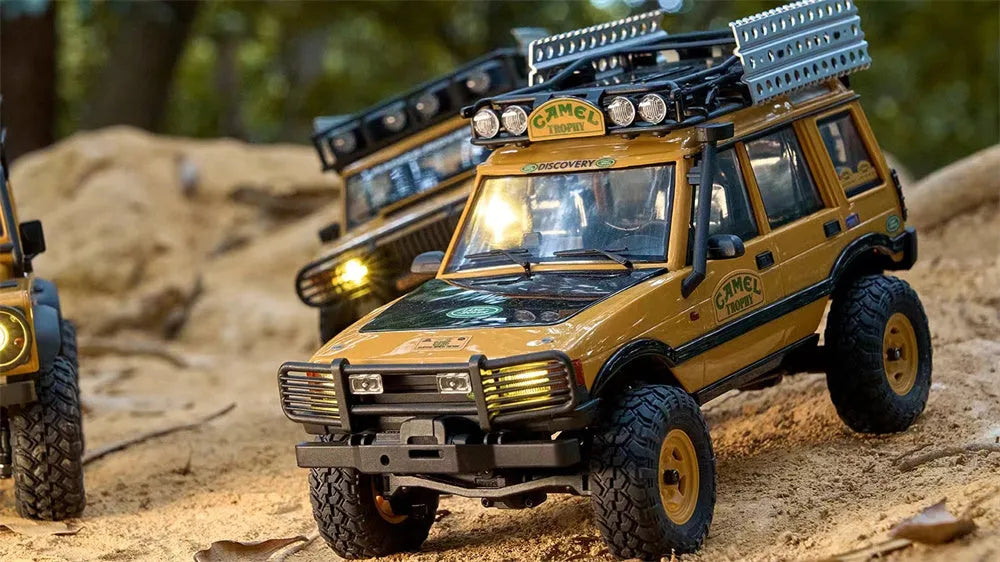 FMS FCX24M 1/24 Scale 4WD RC Rock Crawler Truck - Licensed Range Rover Camel Trophy Edition with LED Lights | 2.4G Remote Control Off-Road Vehicle for Indoor/Outdoor Crawling & Trail Adventures